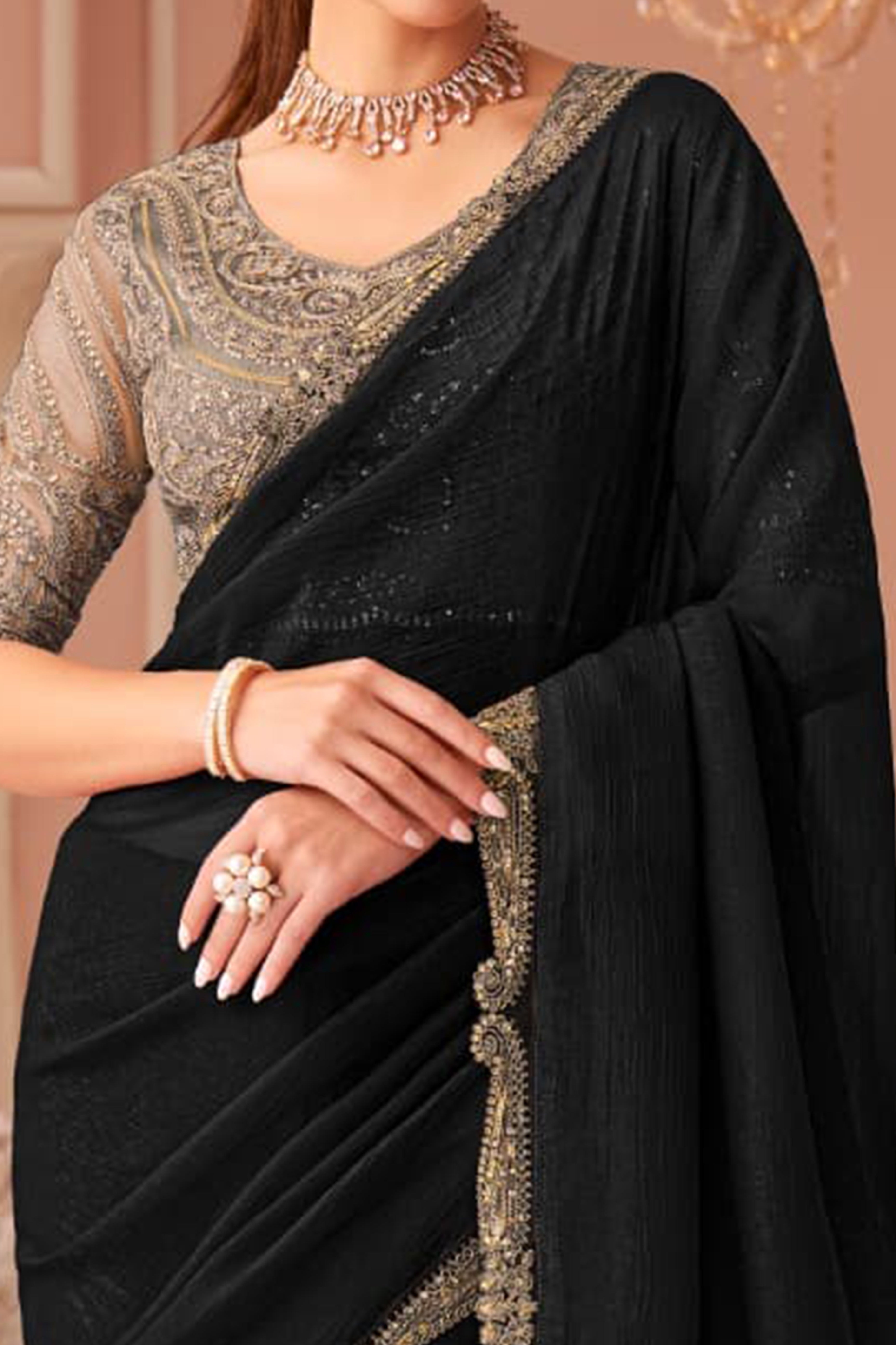 Graceful Black Georgette Saree with Intricate Sequin Embroidery Detailing