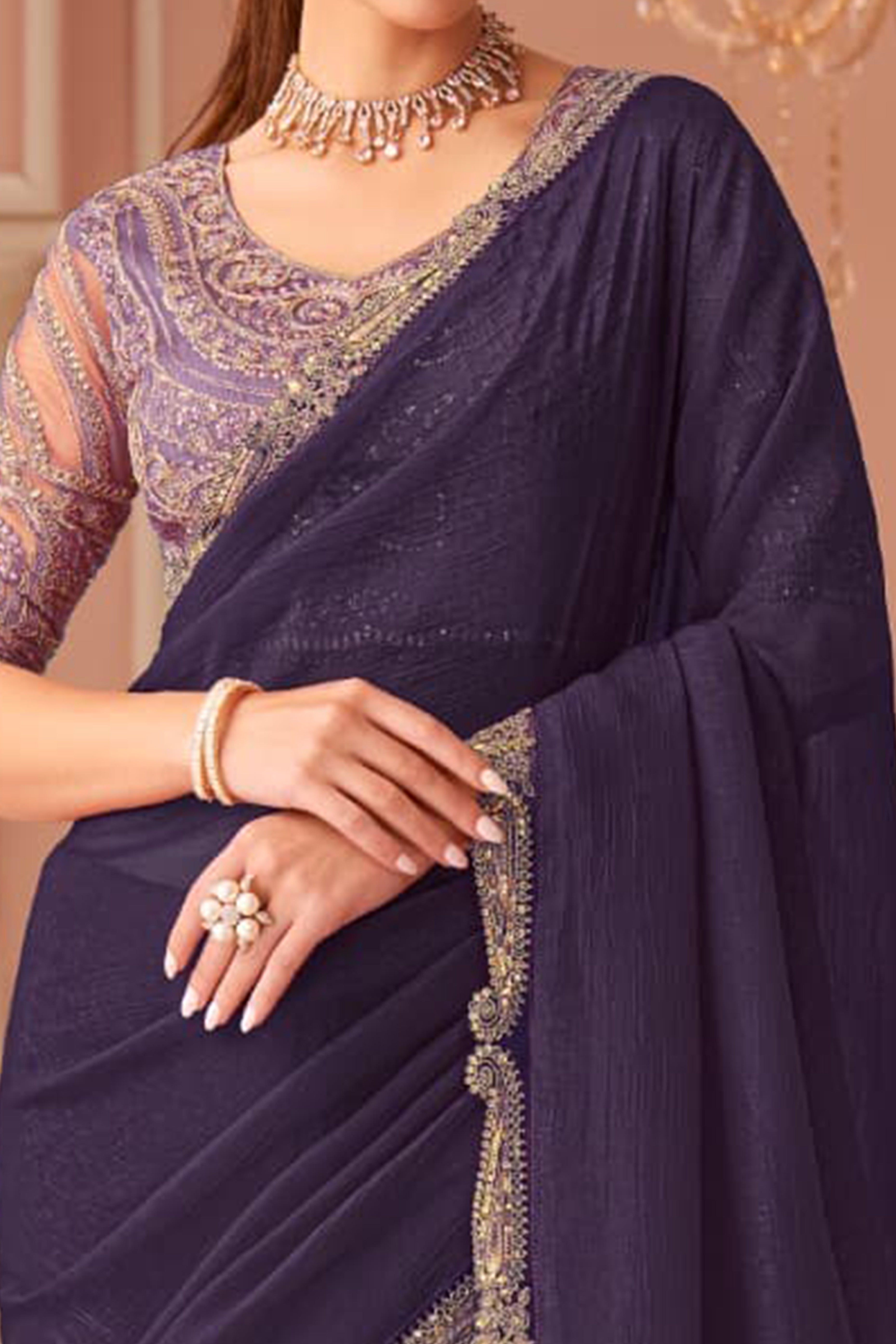 Graceful Purple Georgette Saree with Intricate Sequin Embroidery Detailing