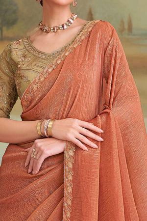 Sophisticated Rust Orange Gold Georgette Saree Accented With Floral Sequins Embroidered Lace Border