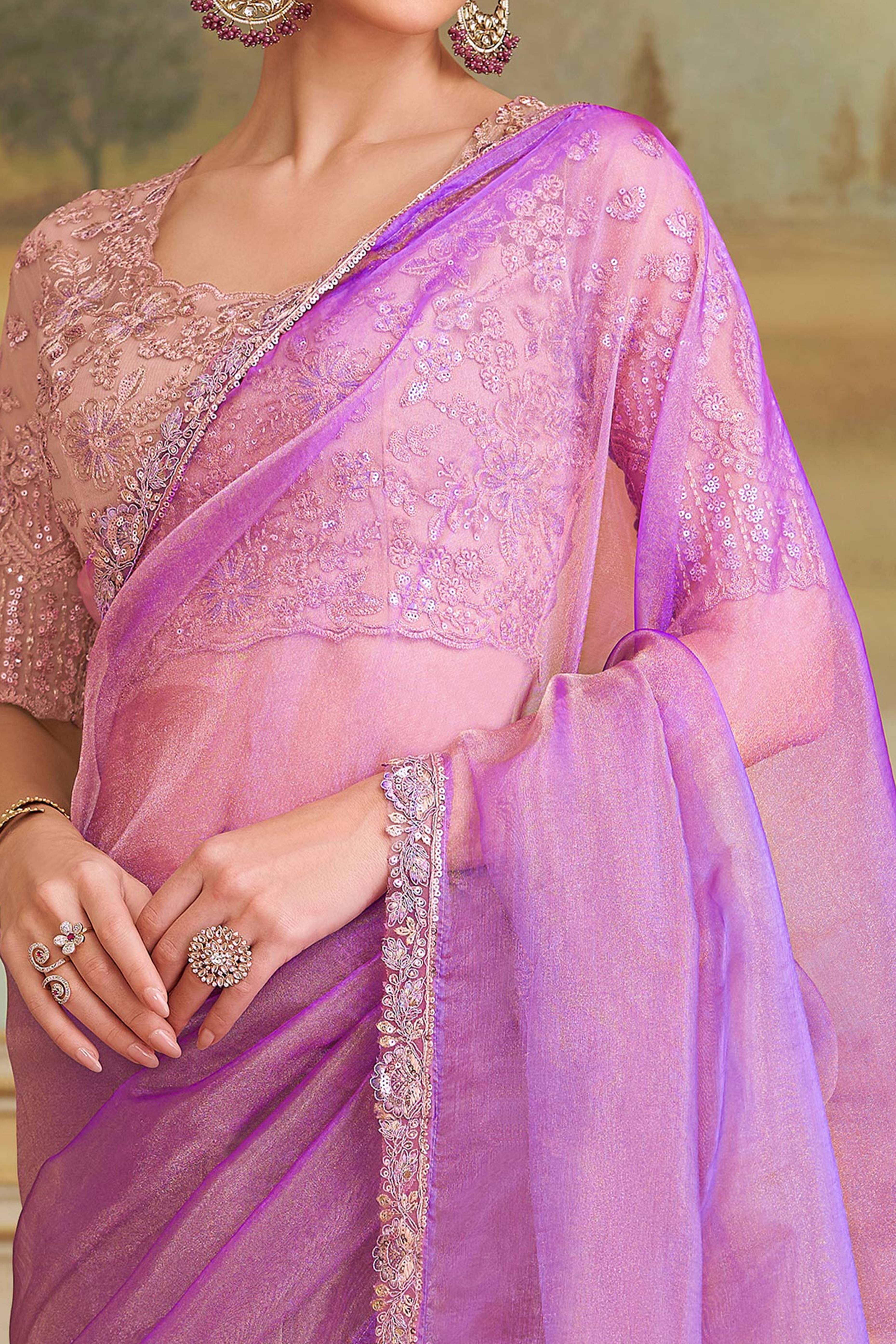 Lustrous Light Magenta Solid Tissue Silk Saree Showcasing Sequins Embroidered & Stylish Lace Border