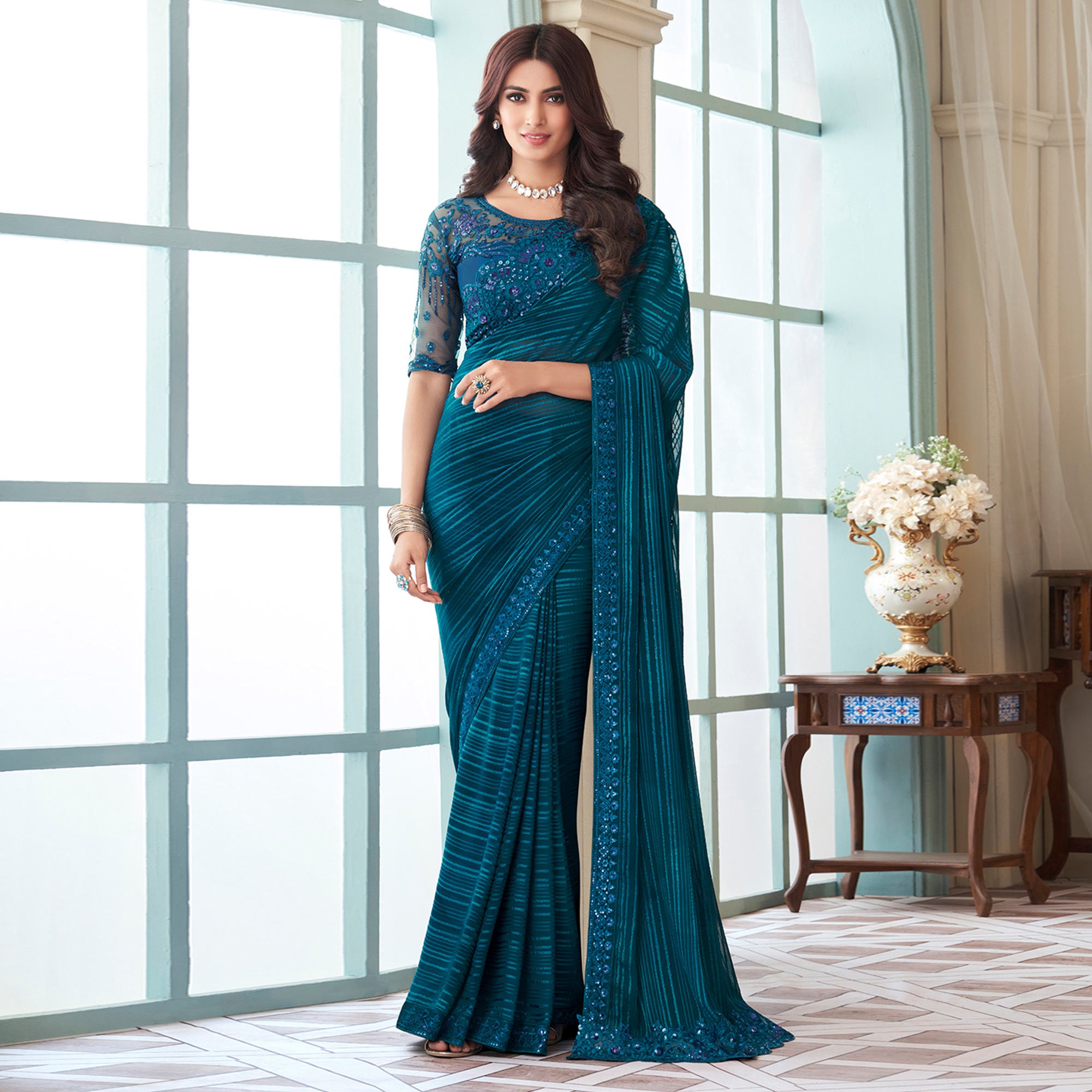 Teal Sequins Embroidered Satin Saree