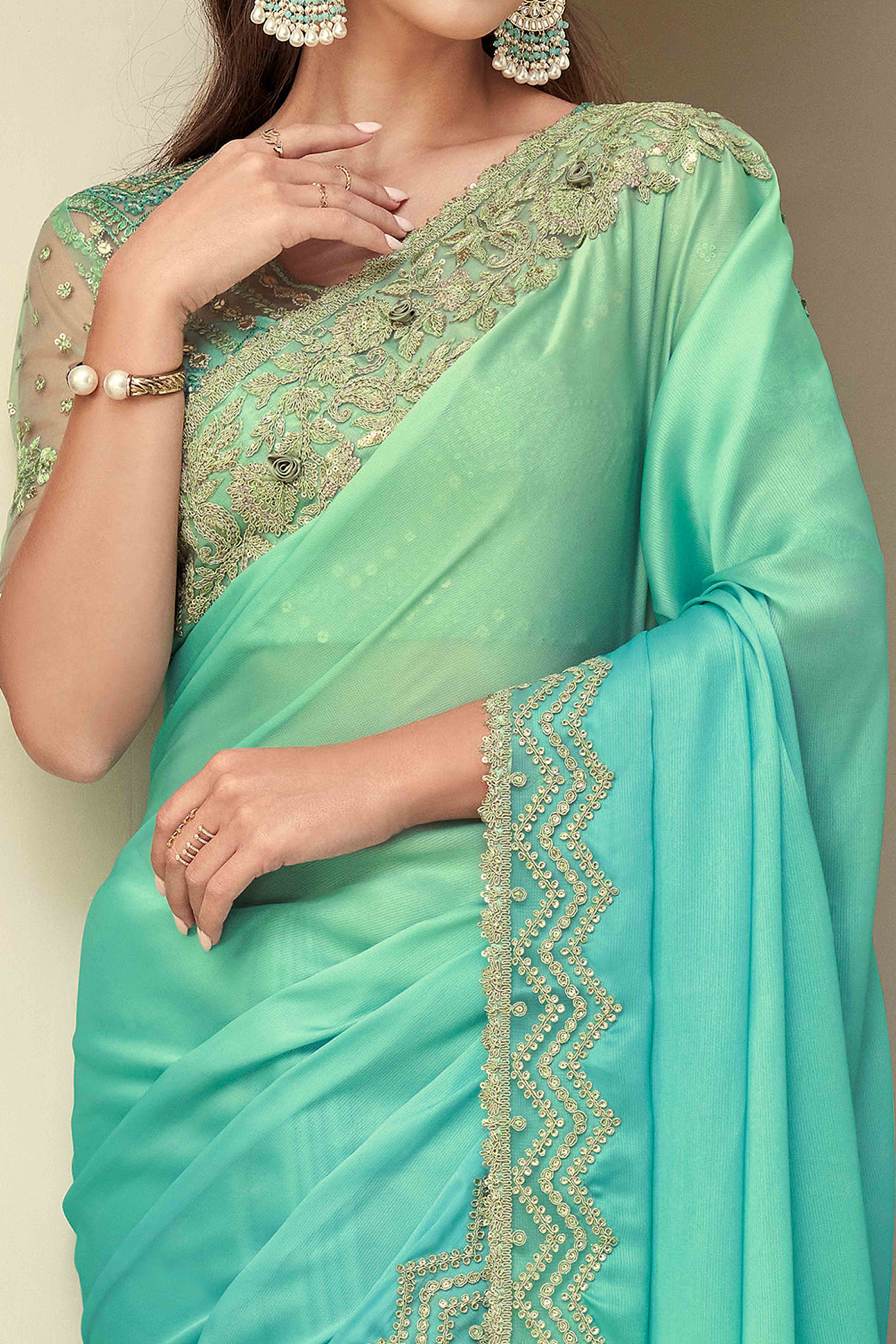 Turquoise Floral Sequins Embroidered Georgette Saree