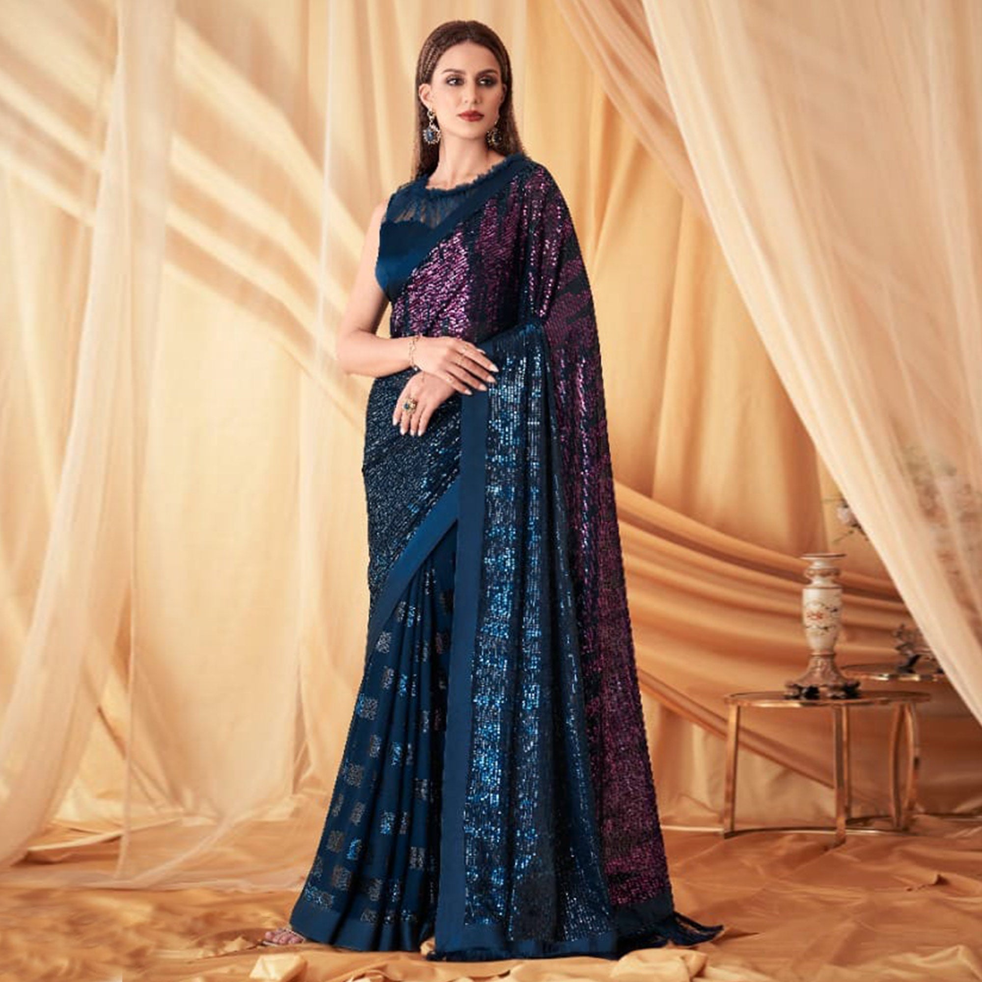 Blue Sequins Embroidered Georgette Saree With Tassels