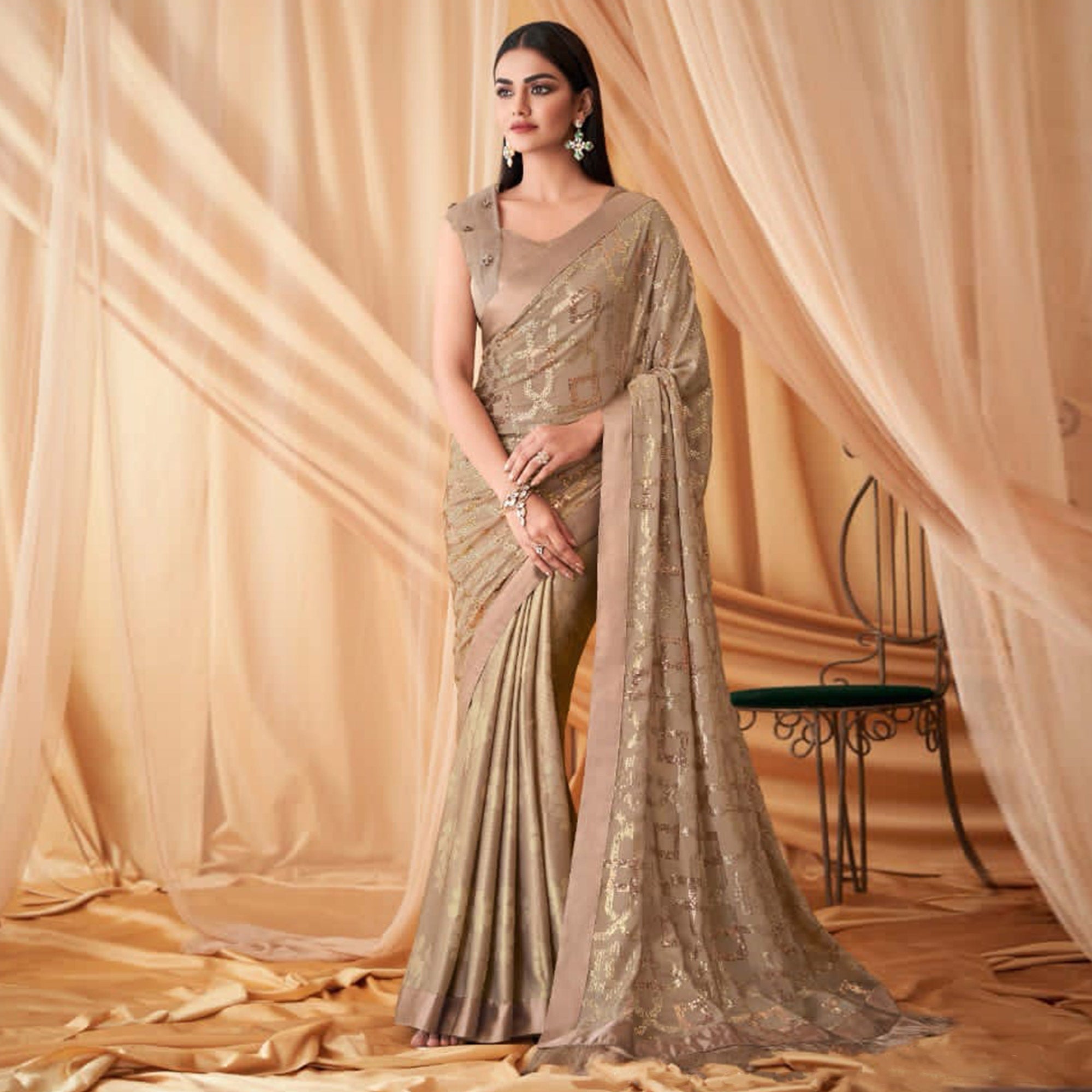 Beige Sequins Embroidered Georgette Saree With Tassels