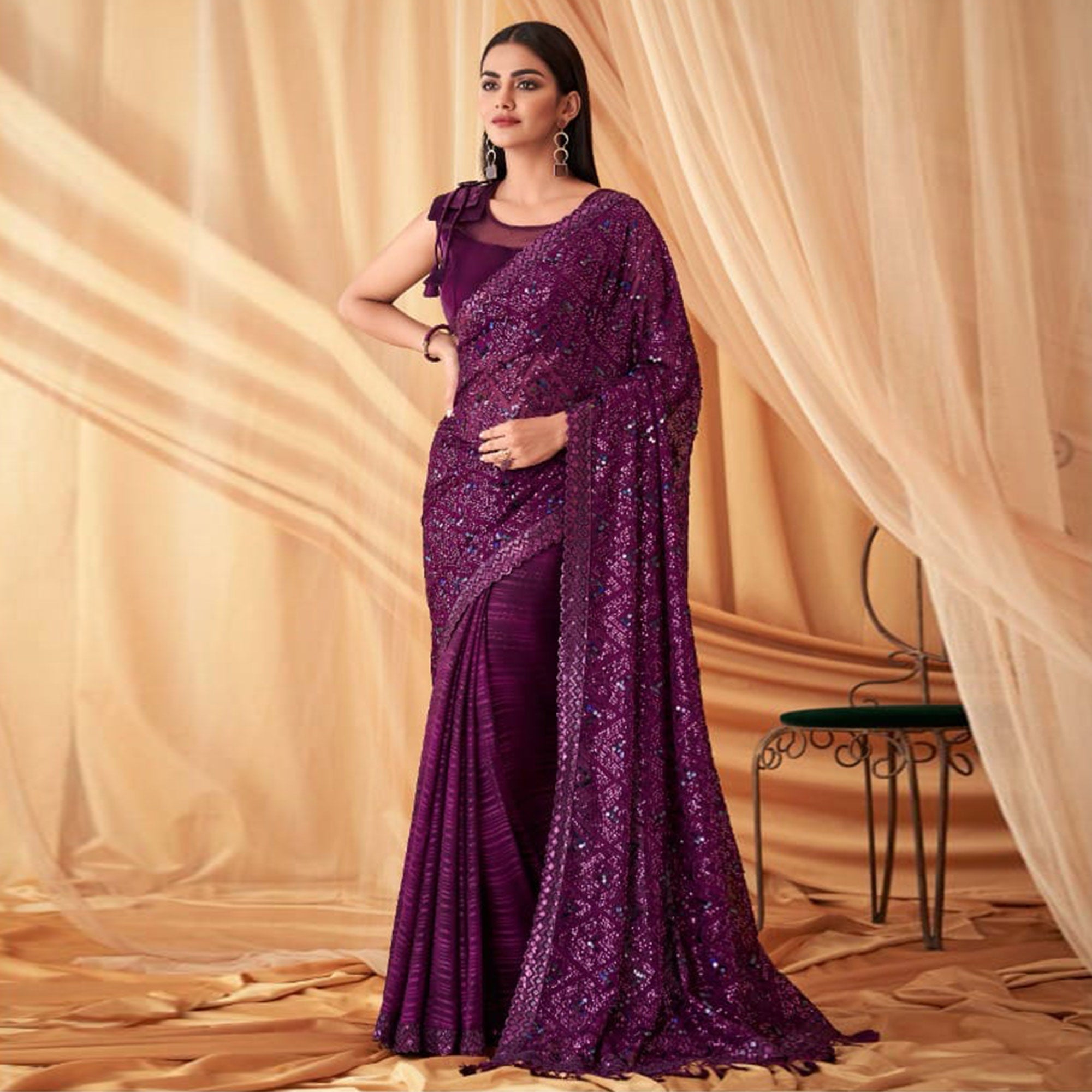 Purple Sequins Embroidered Georgette Saree With Tassels