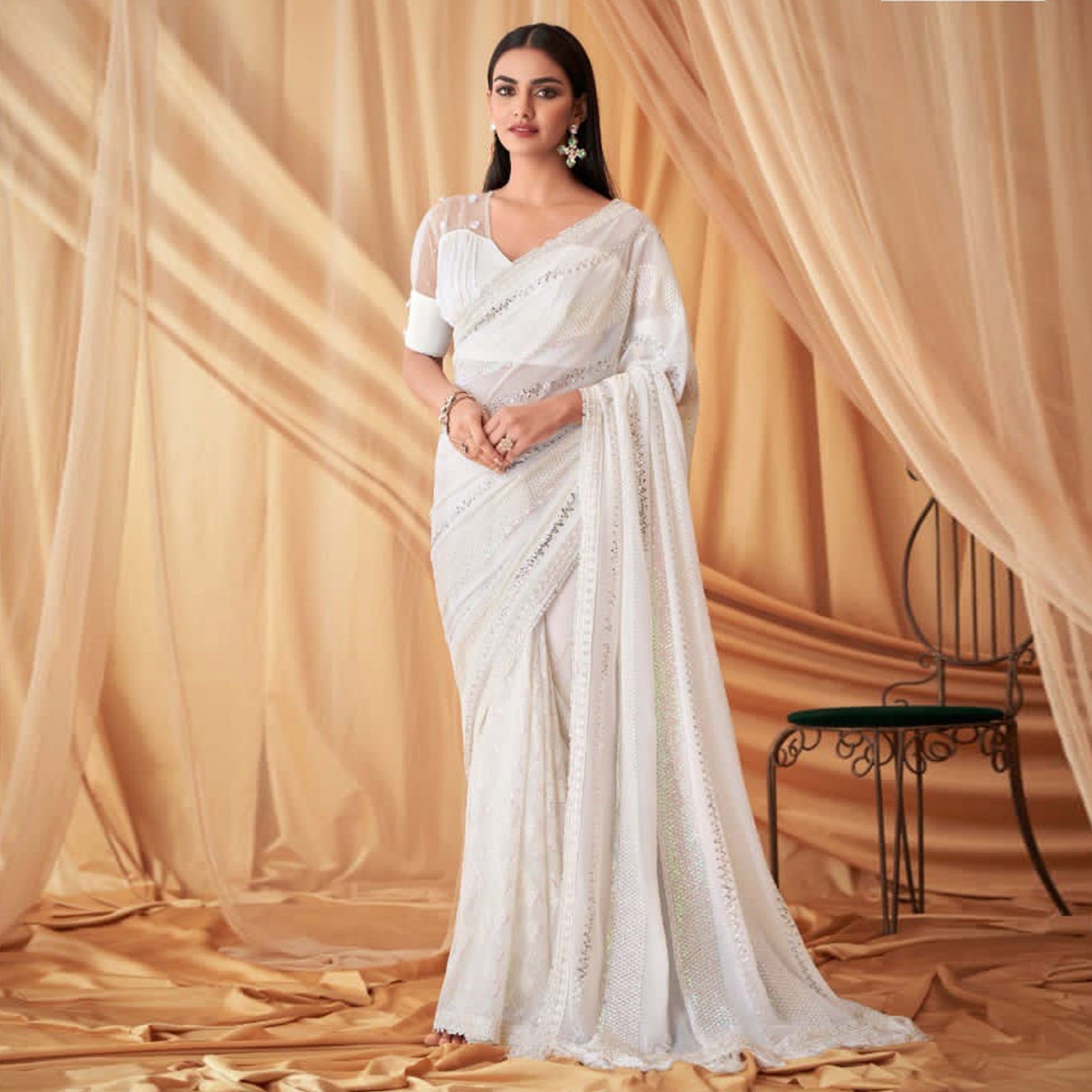 White Sequins Embroidered Georgette Saree With Tassels
