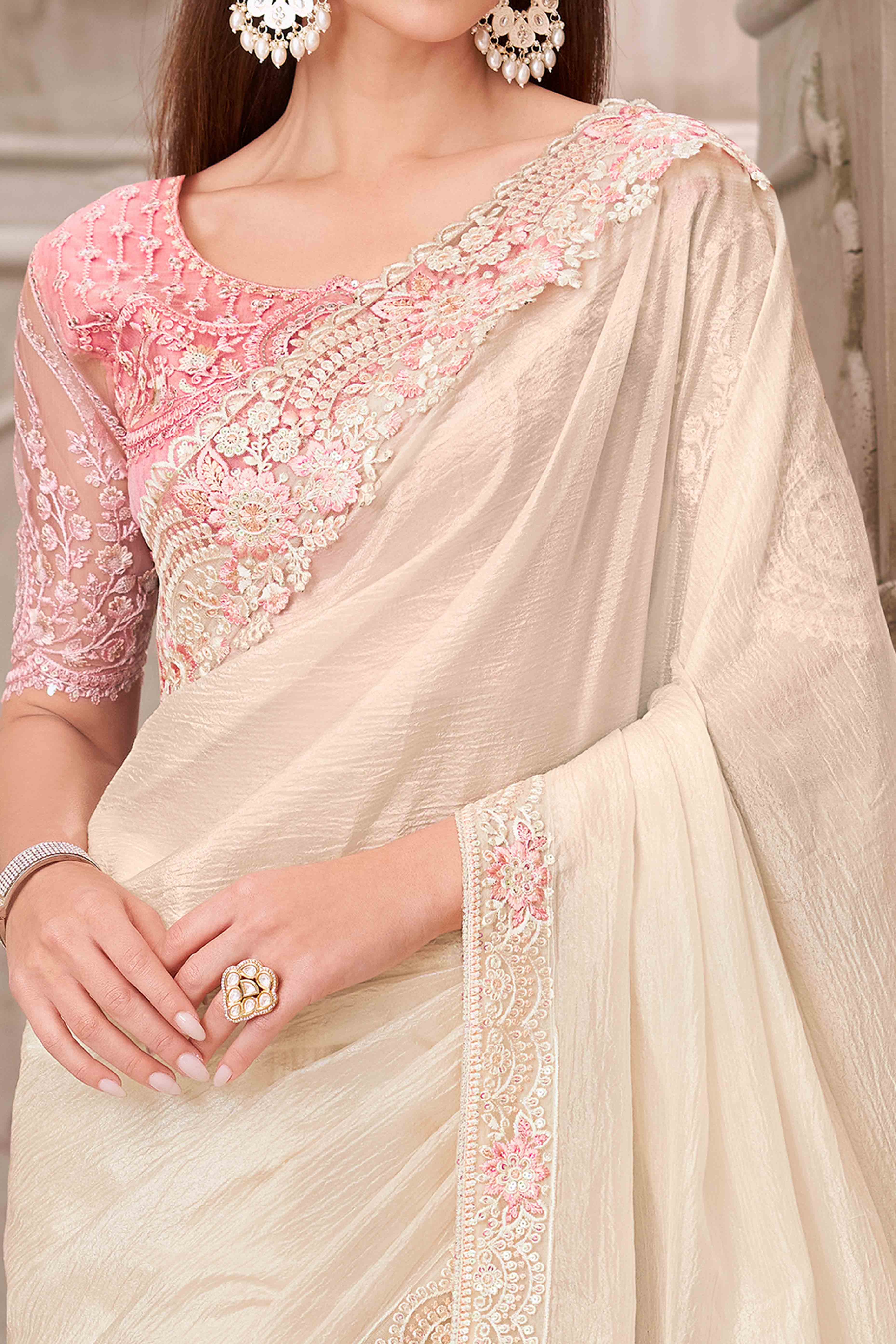 Glamorous Off White Satin Saree with Intricate Sequin & Floral Work