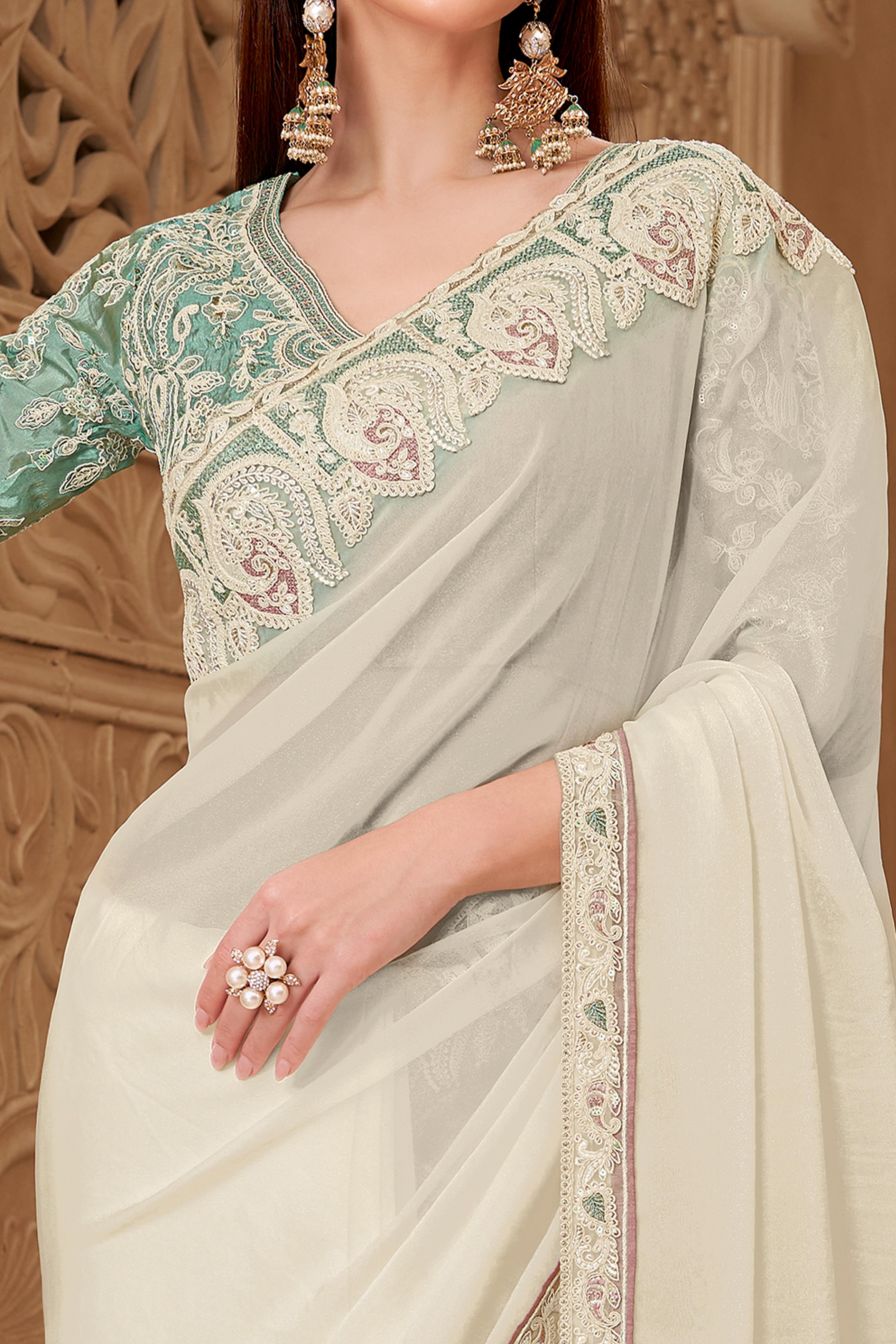 Shimmering Cream Georgette Saree with Graceful Thread Embellishment and Sequins