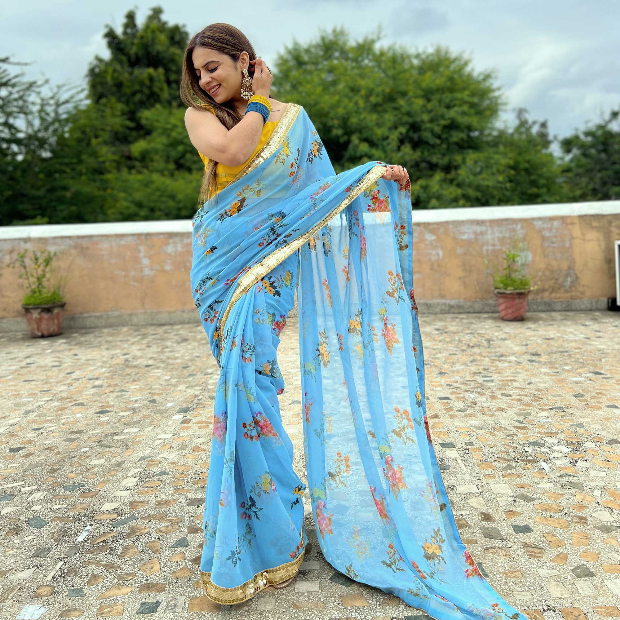 Blue Printed With Sequins Border Georgette Saree