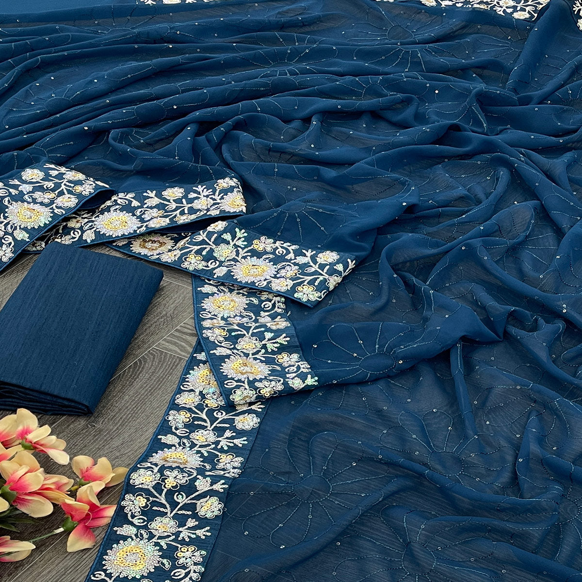 Teal Georgette Saree Featuring Fine Sequin Embroidery for a Glam Look