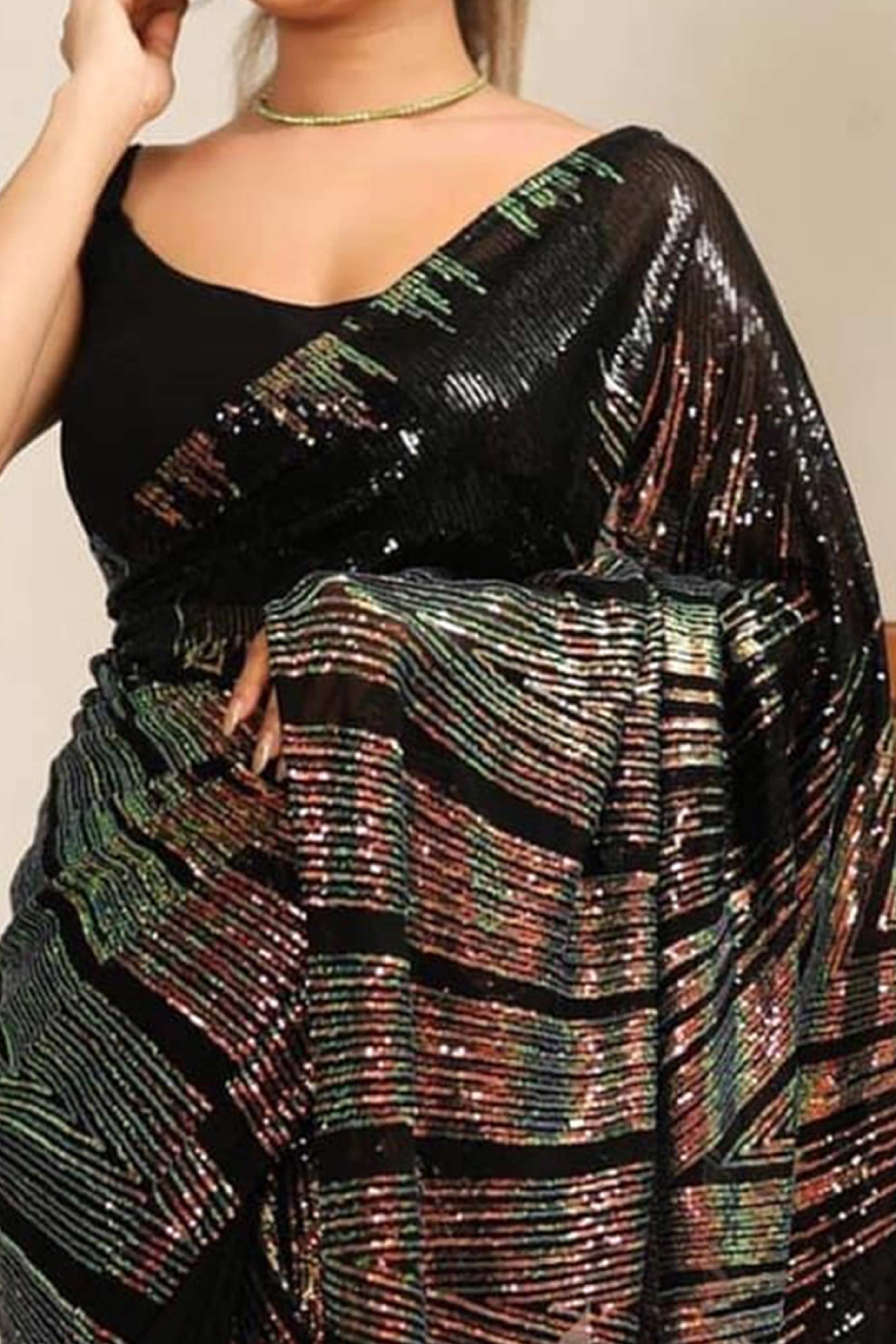 Stunning Black Georgette Partywear Saree Adorned with All-Over Sequin Embellishments