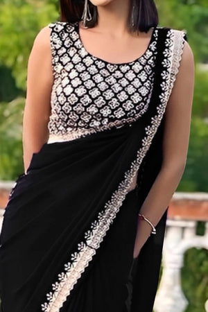 Black Georgette Saree With Sleek Solid Finish And Embroidered Edging