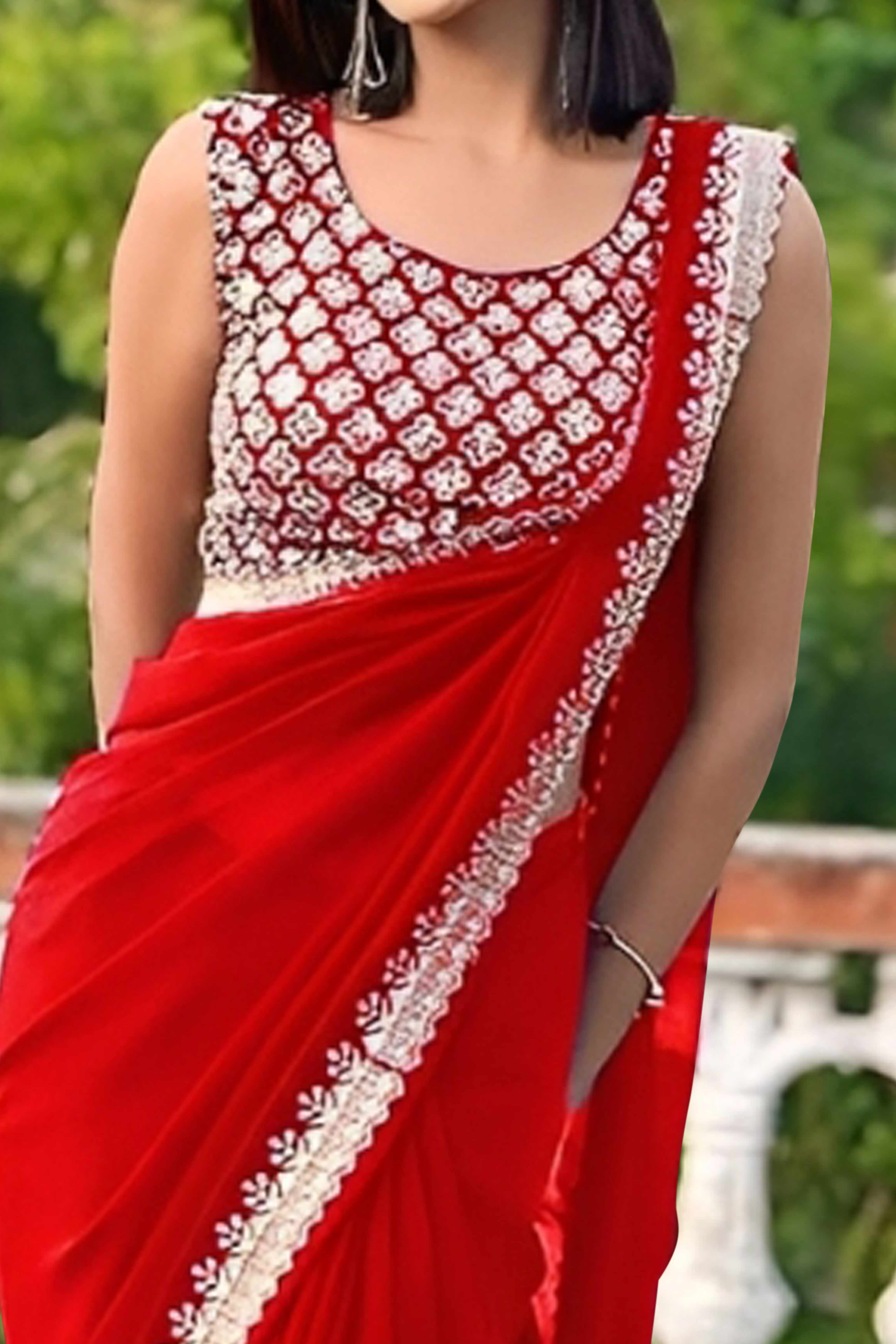 Red Georgette Saree With Sleek Solid Finish And Embroidered Edging