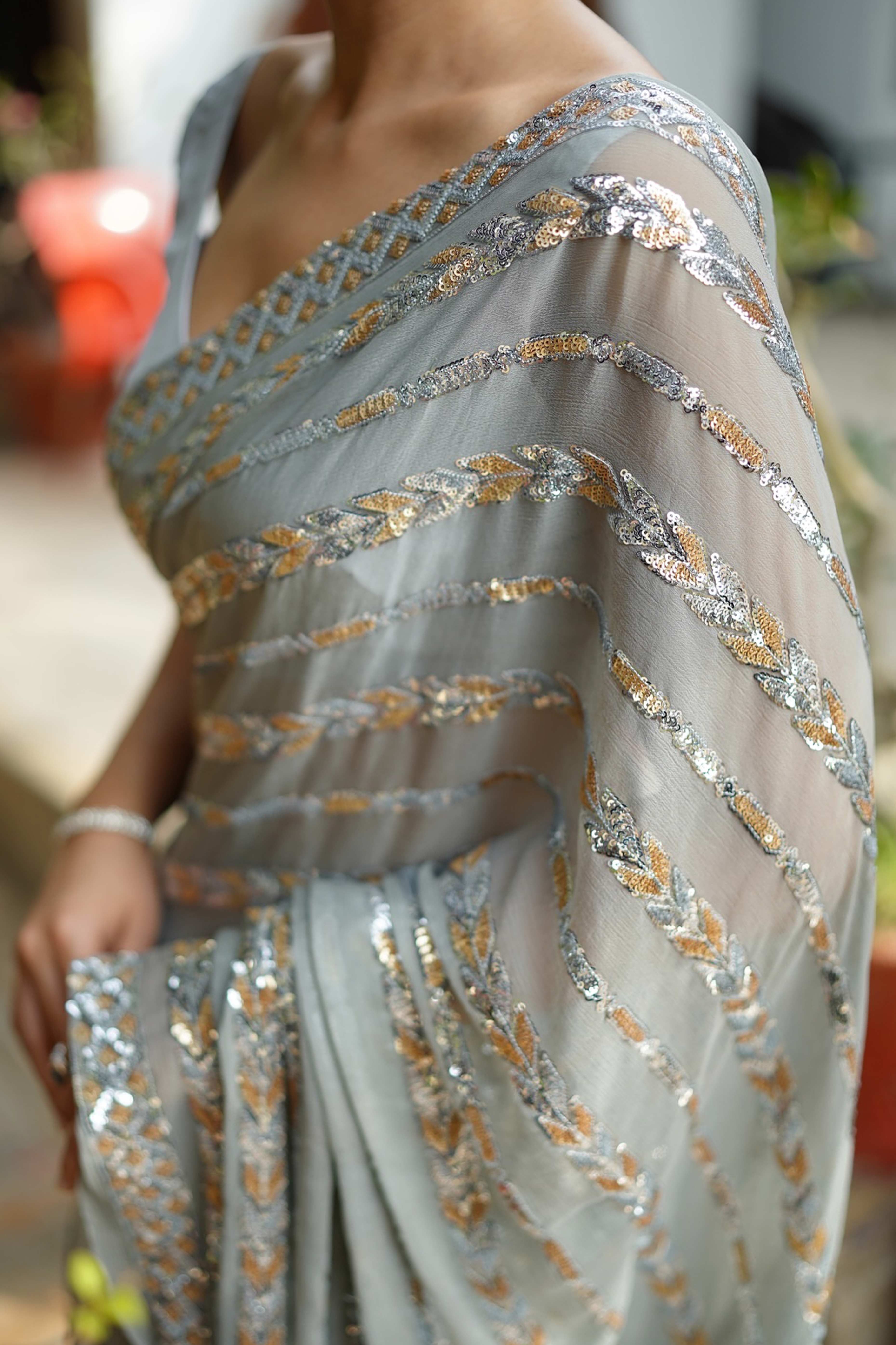 Stylish Grey Striped Georgette Saree Featuring All-Over Sequin Embroidery