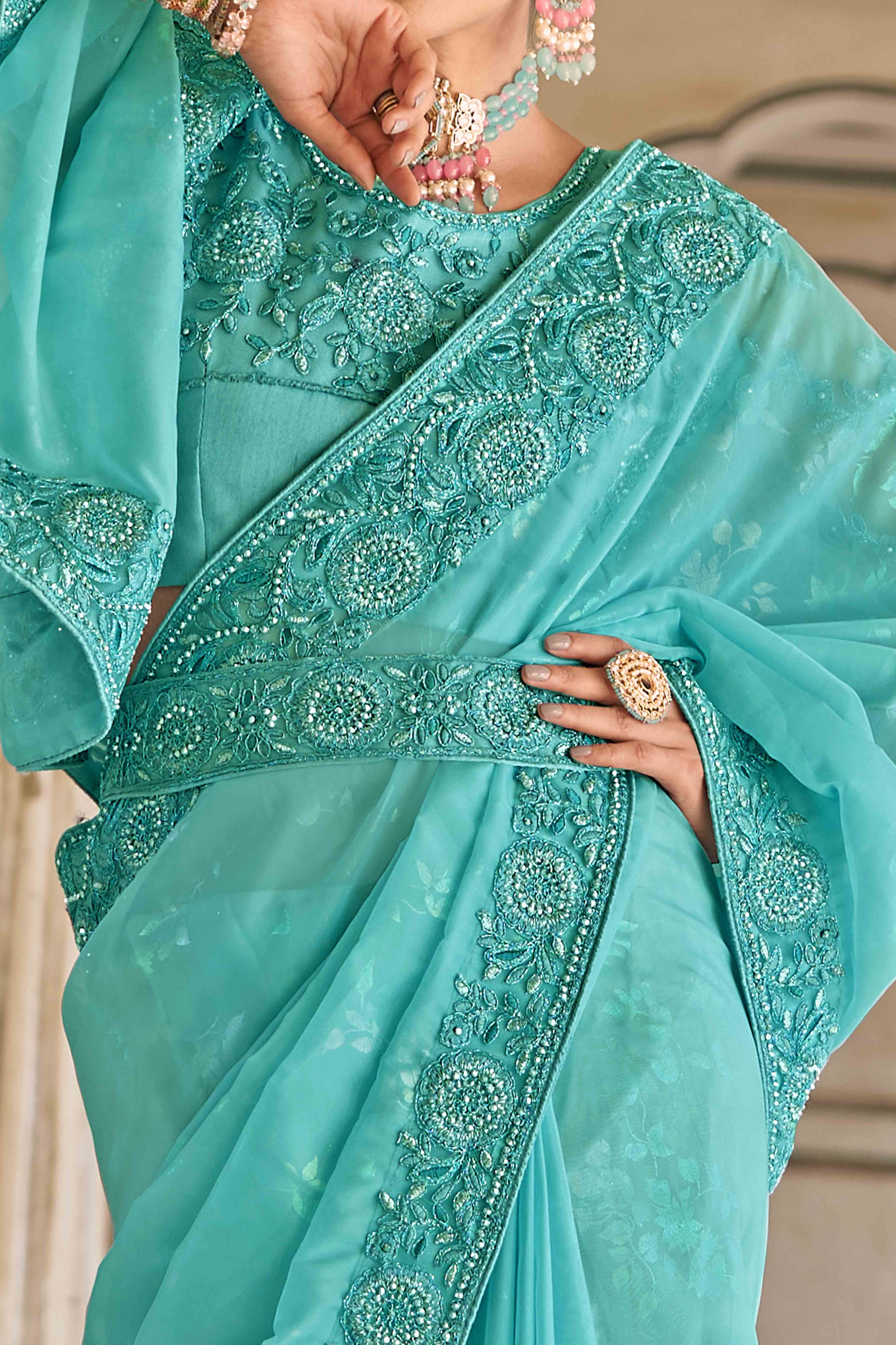 Turquoise Sequins Embroidered Georgette Saree
