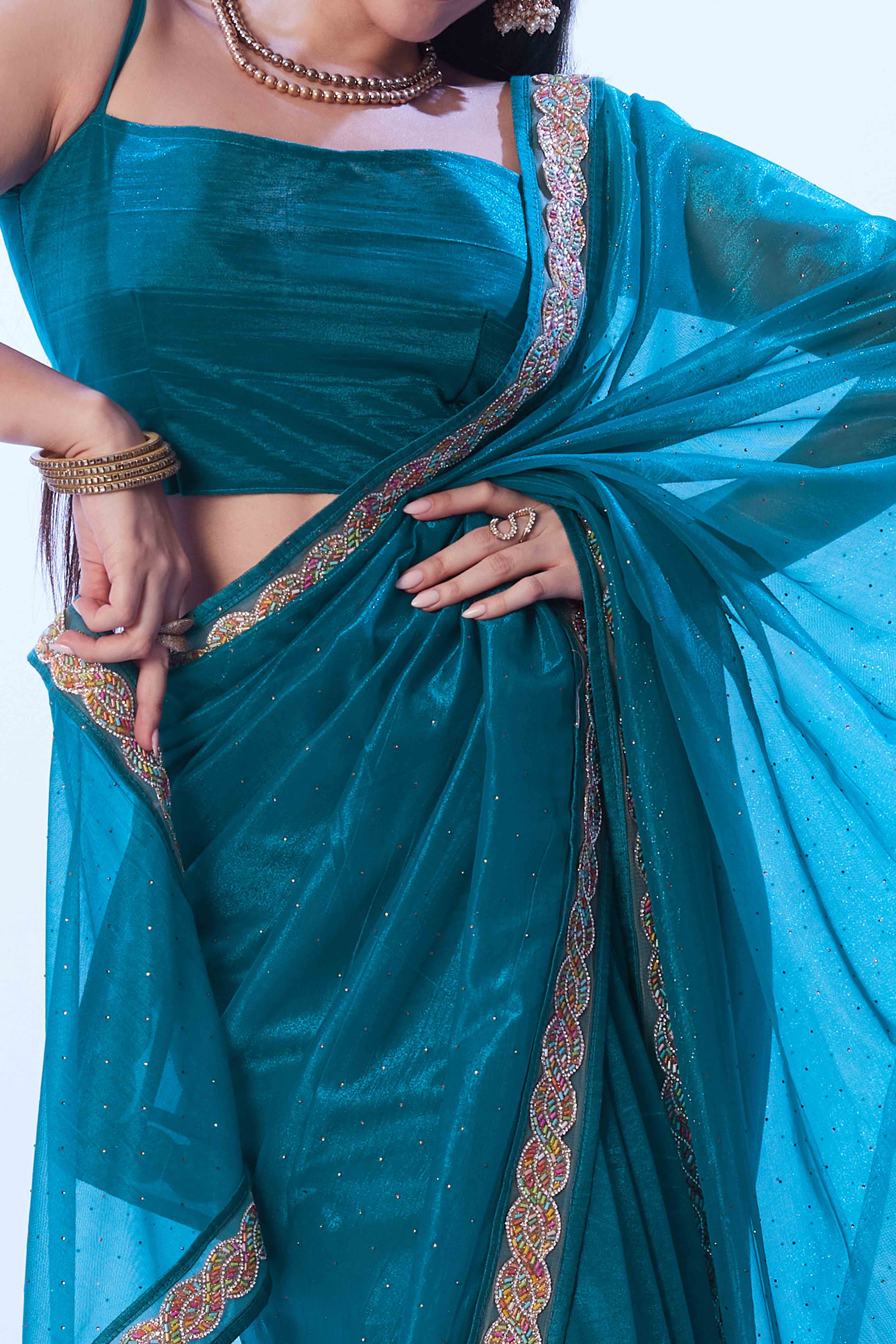 Teal Stone Work Net Solid  Embroidered Saree for Party Wear