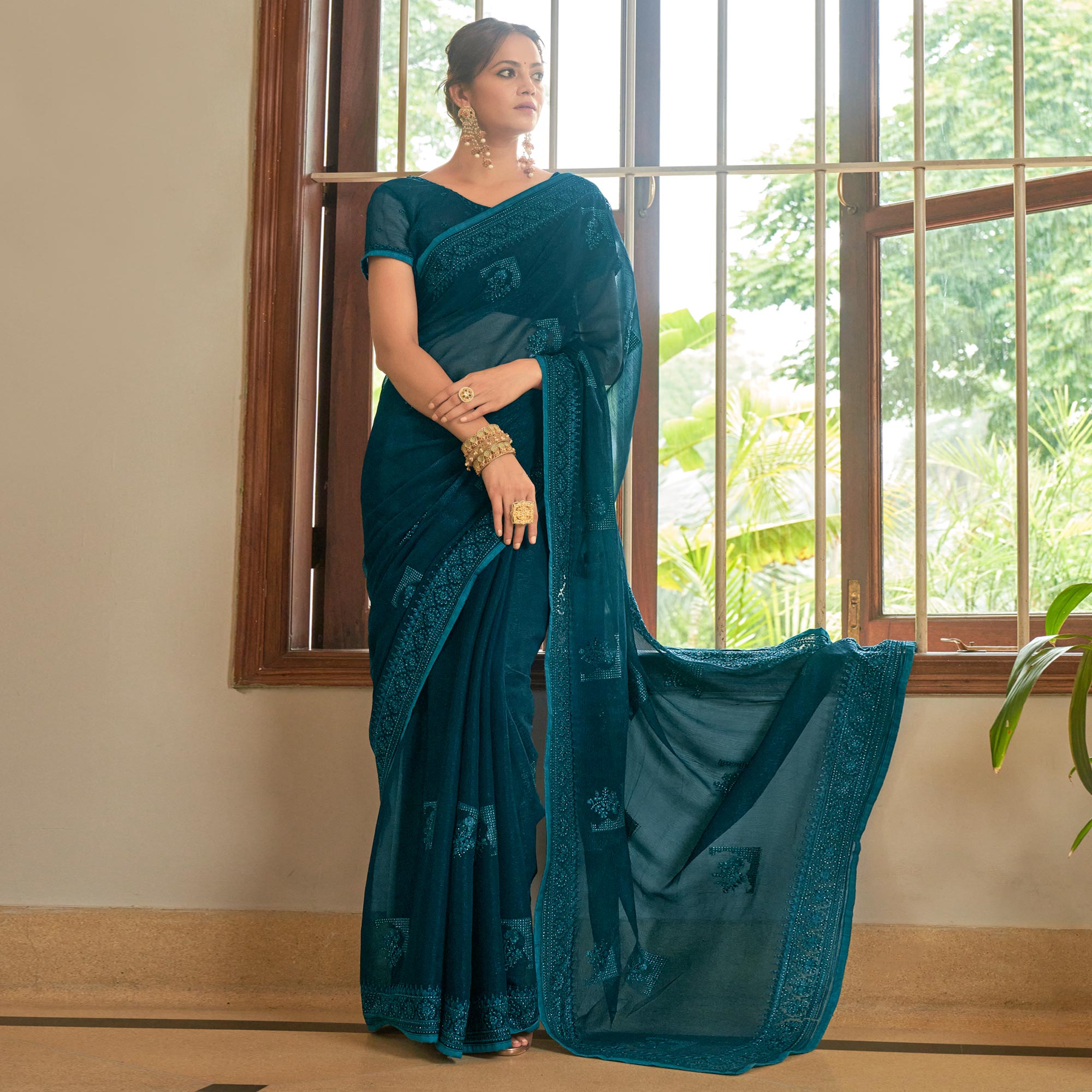 Teal Blue Embroidered Georgette Saree