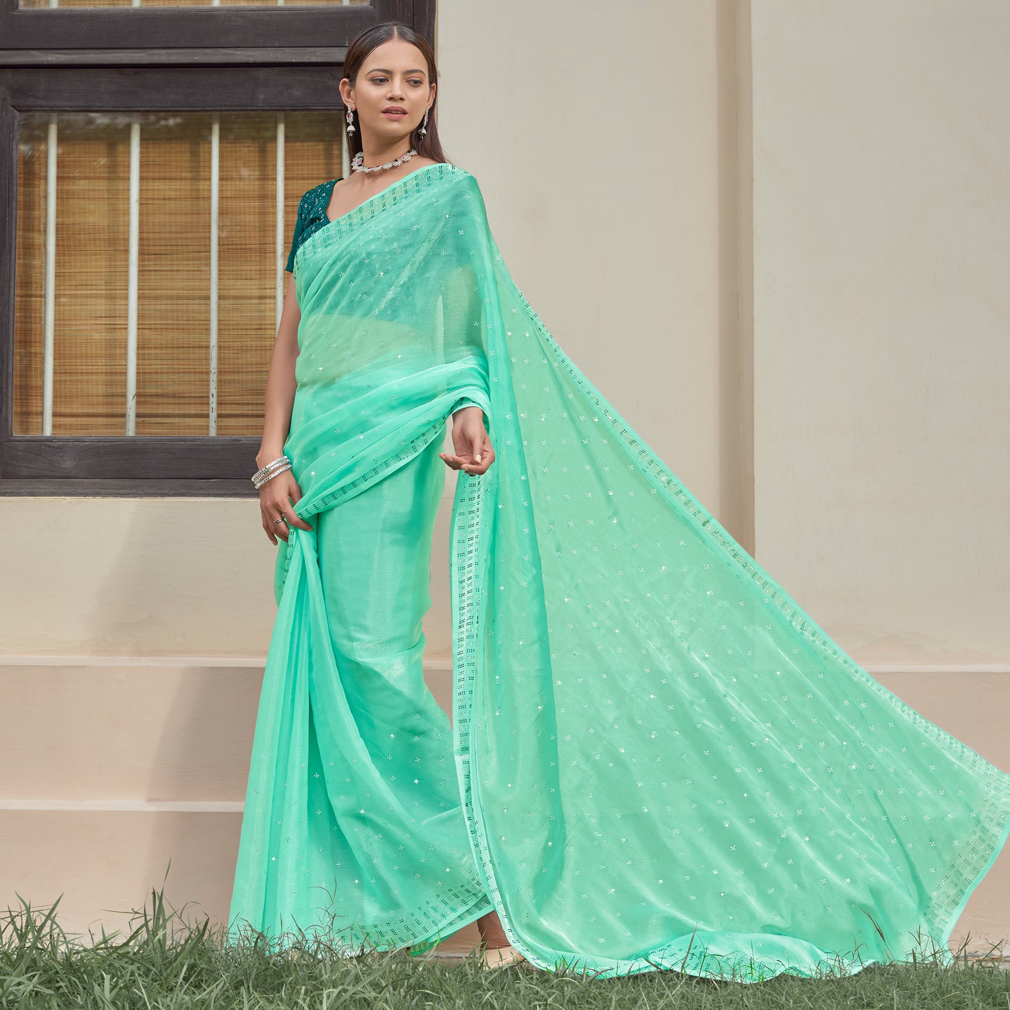 Turquoise Embroidered Tissue Saree