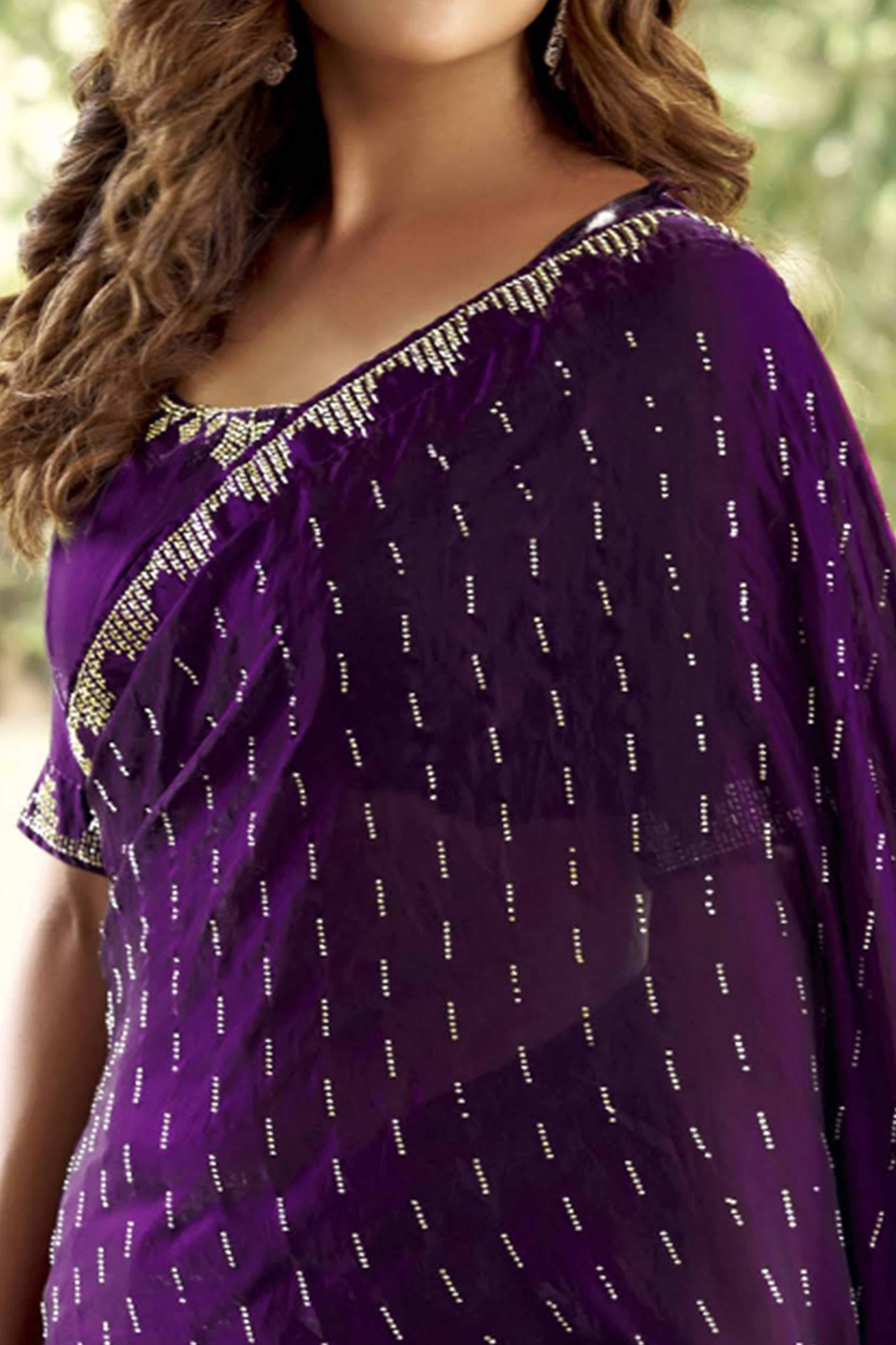 Graceful Purple Nylon Partywear Saree Adorned with Exquisite Stone Work