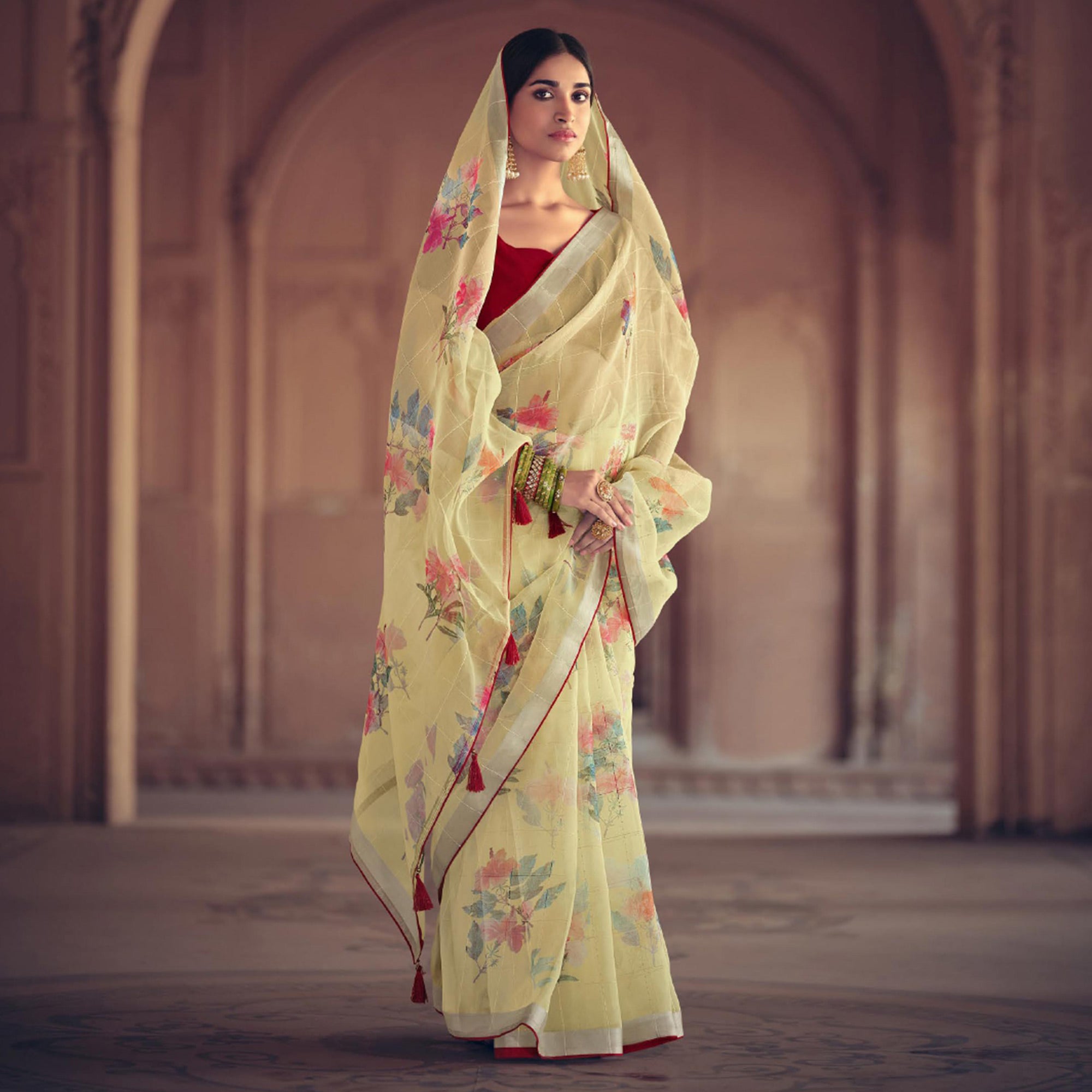 Yellow Floral Printed With Sequins Work Organza Saree With Tassels