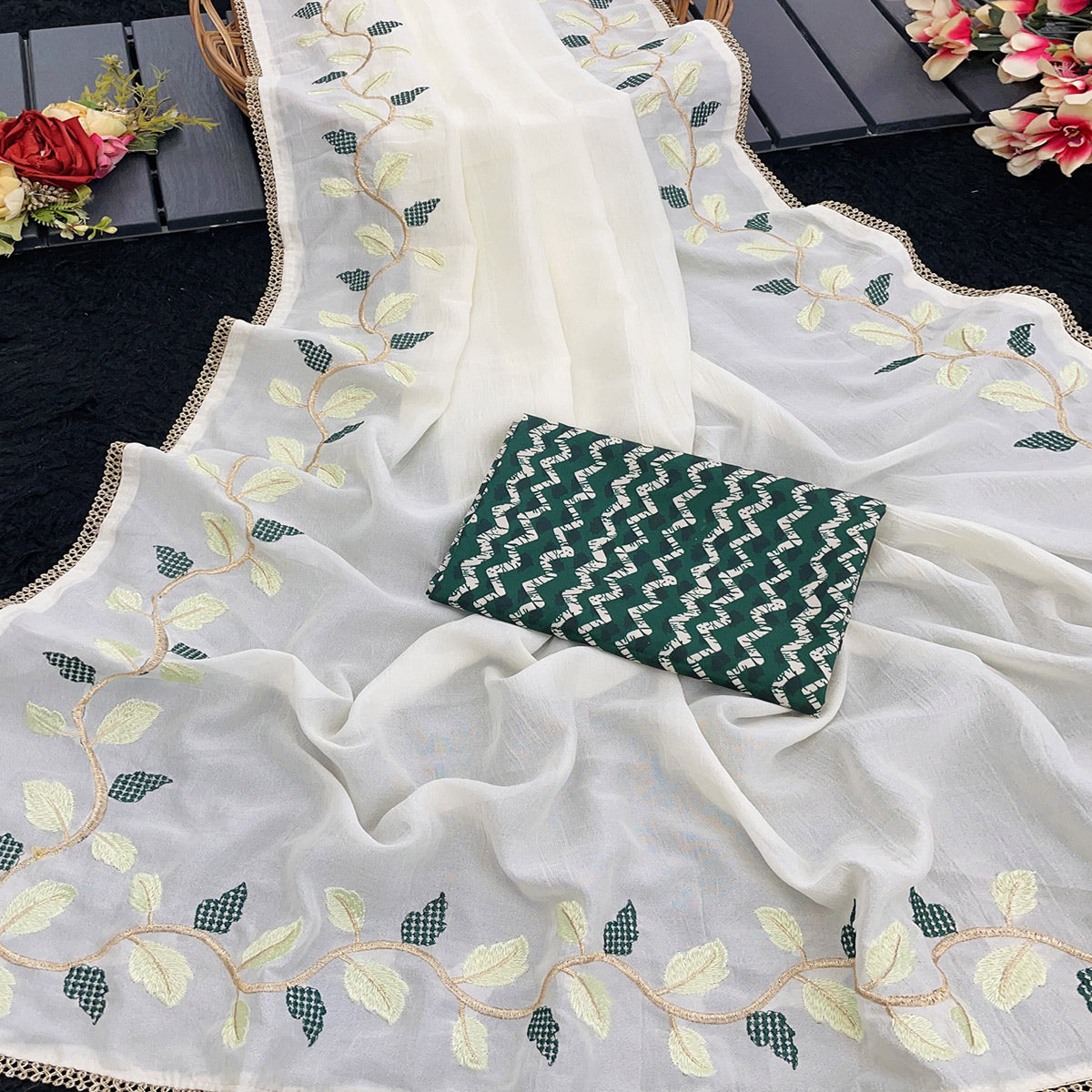 Elegant Offwhite & Green Pure Silk Saree With Intricate Thread Embroidery And Delicate Lace Border