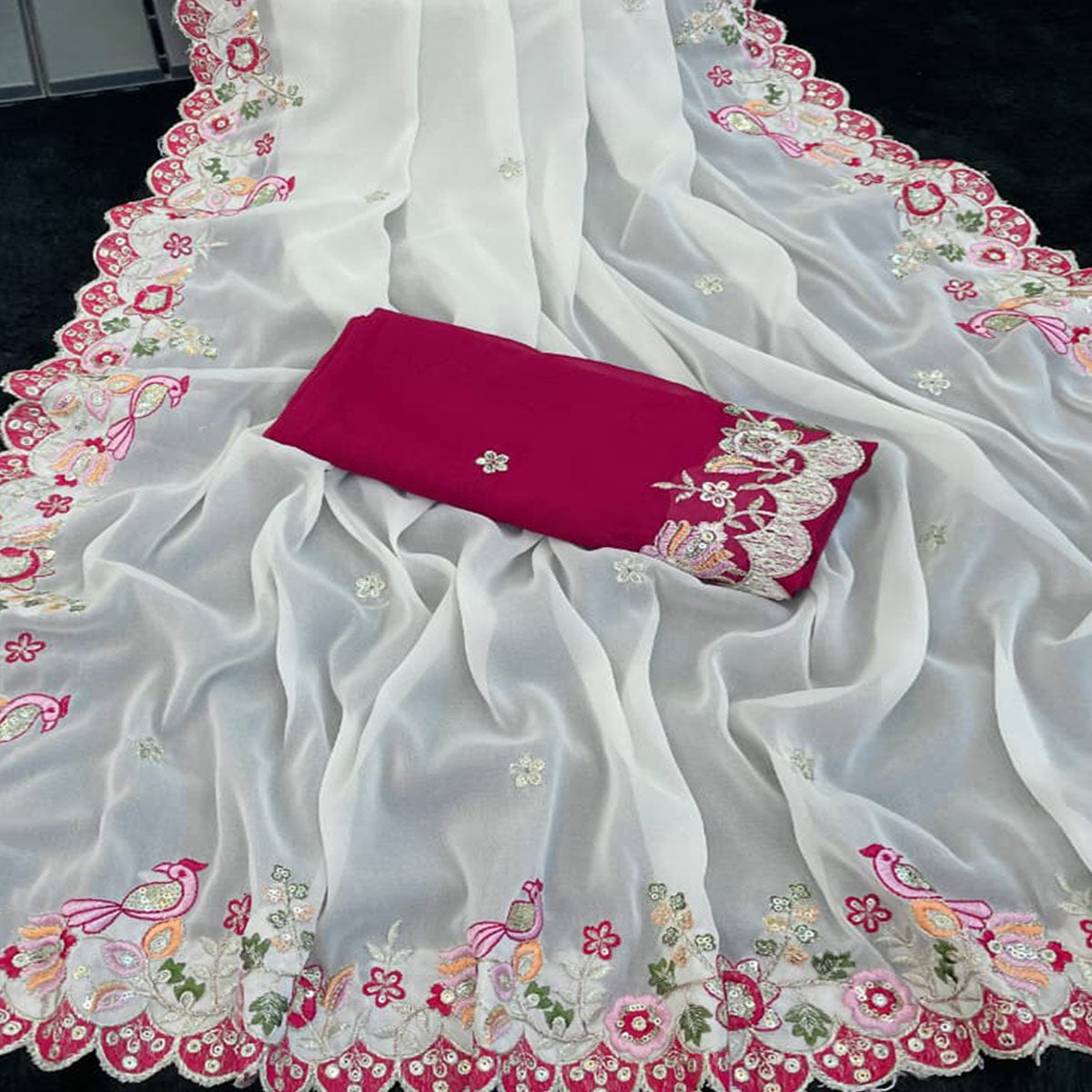 Stylish Off White Georgette Partywear Saree with Beautifully Embroidered Border Detailing