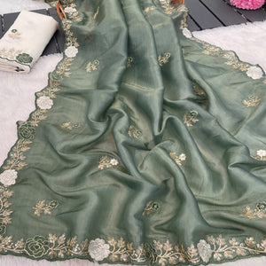 Green Lightweight Georgette Crush Saree Adorned with Delicate Floral Embroidery