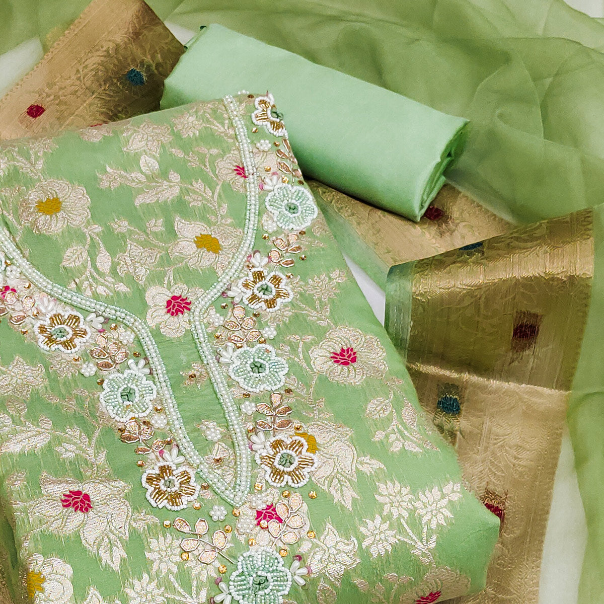 Green Floral Woven With Hand Embroidery Muslin Dress Material