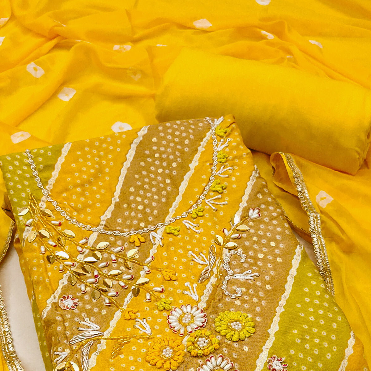 Yellow Bandhani Printed With Hand Embroidery Rayon Dress Material