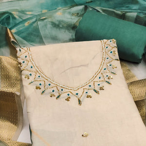 Green Cambric Cotton Dress Material Adorned With Floral Prints & Hand Moti Embellishment