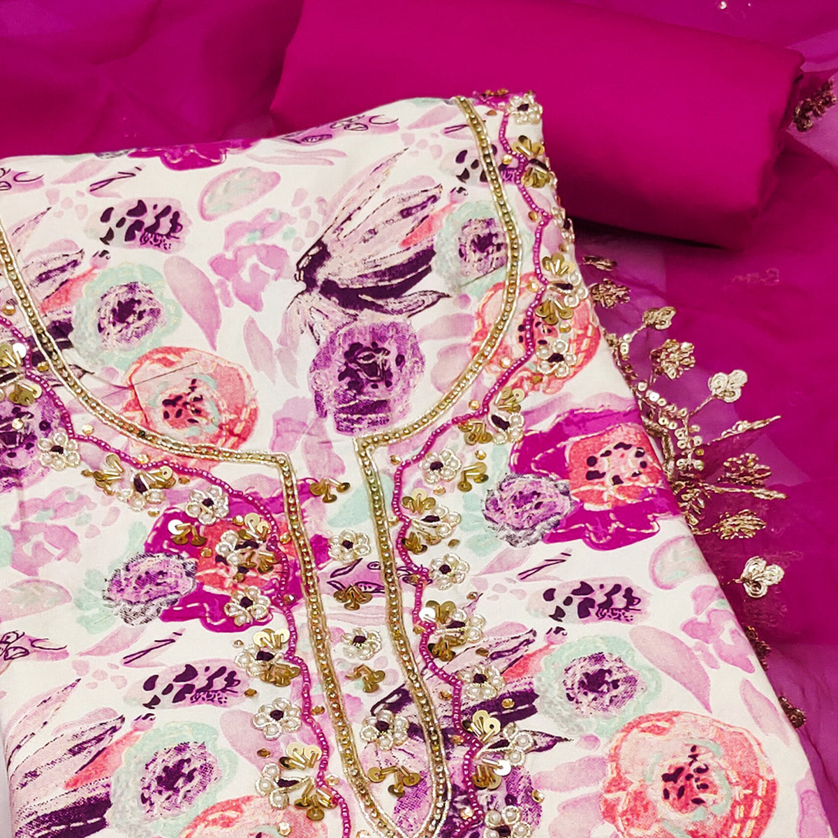 Pink Printed Blue Pure Cotton Dress Material Enhanced With Moti & Hand Embroidered Sequins