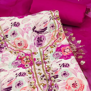 Pink Printed Blue Pure Cotton Dress Material Enhanced With Moti & Hand Embroidered Sequins