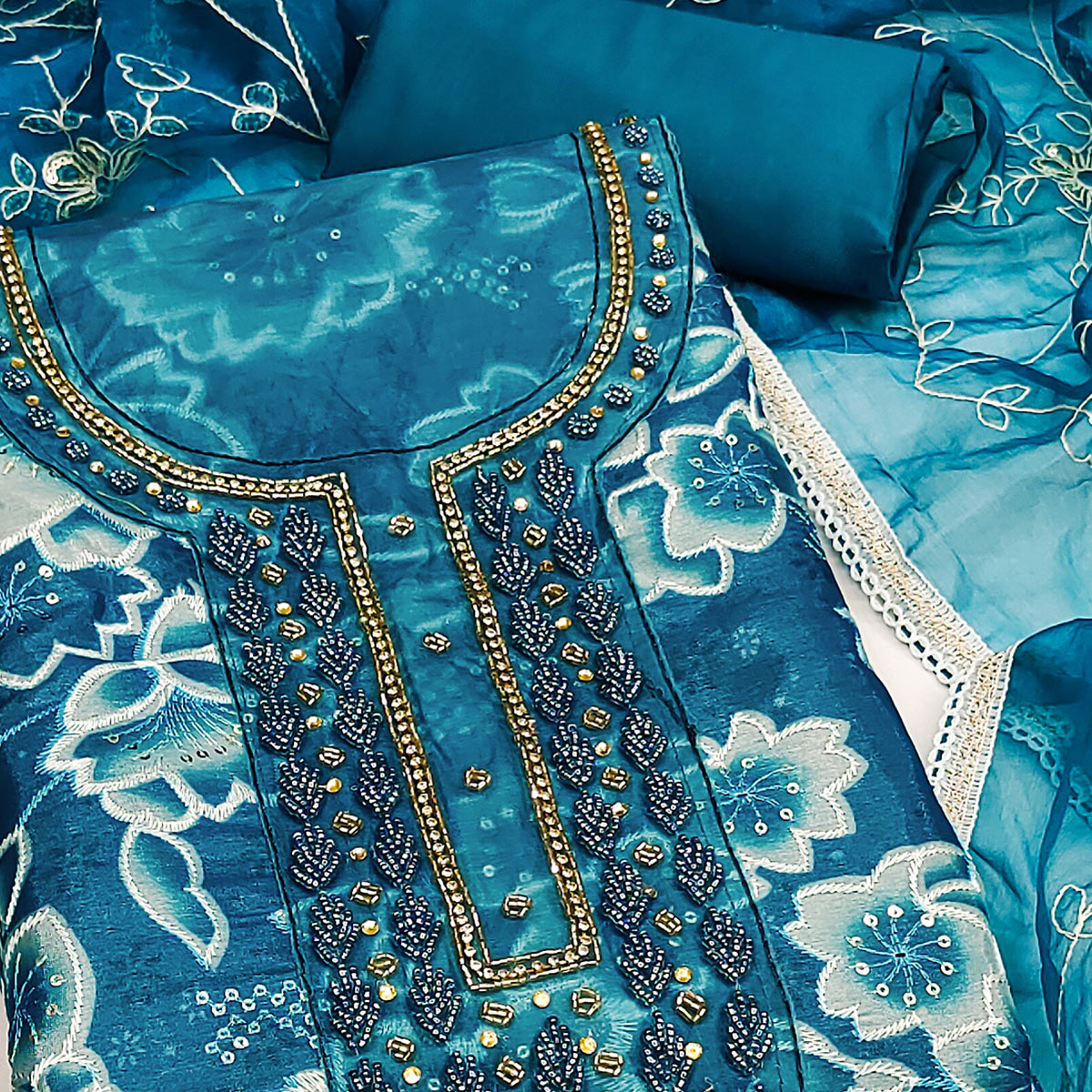 Blue Delicate Floral Sequins & Hand Embellishments On Flowing Organza Dress Material