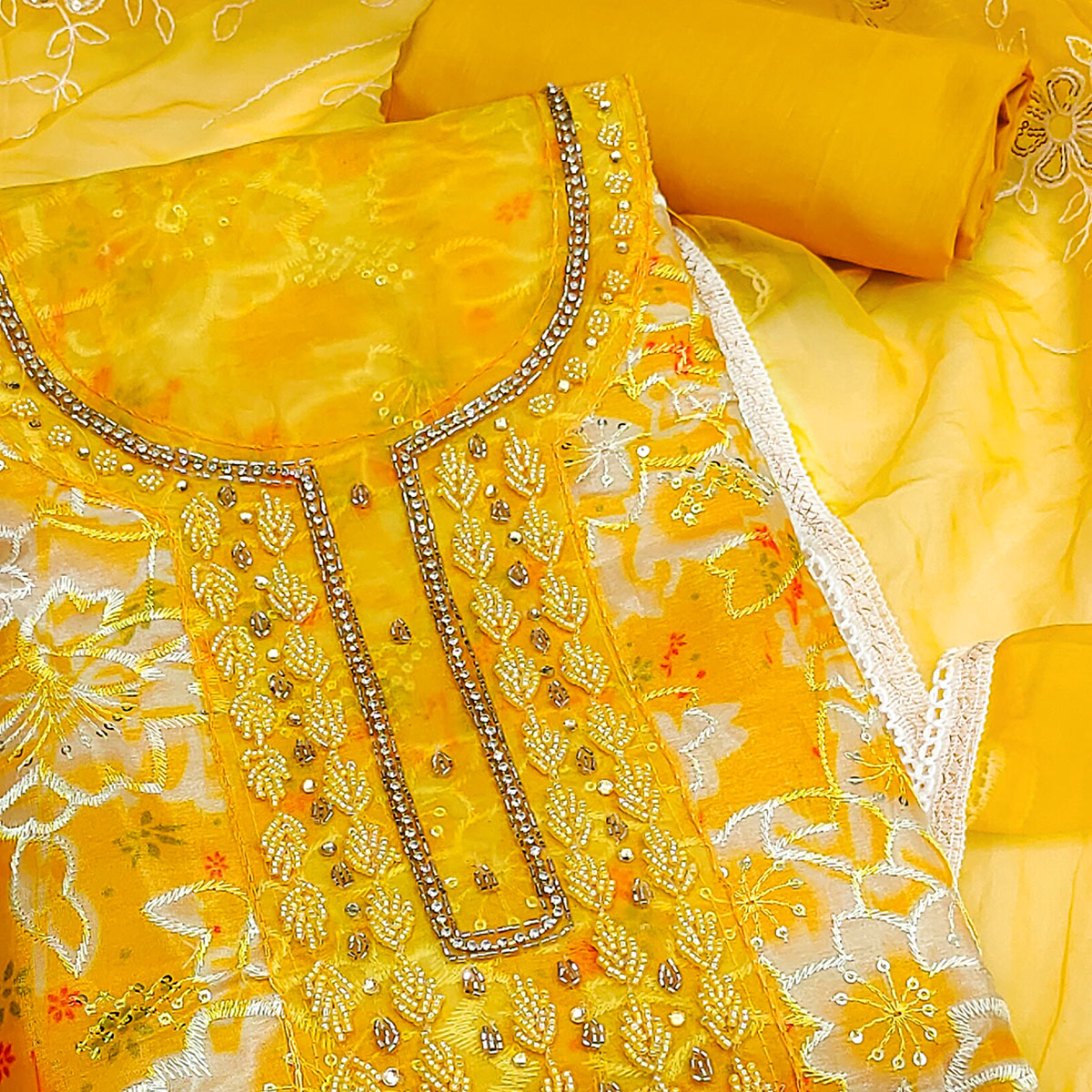 Yellow Delicate Floral Sequins & Hand Embellishments On Flowing Organza Dress Material