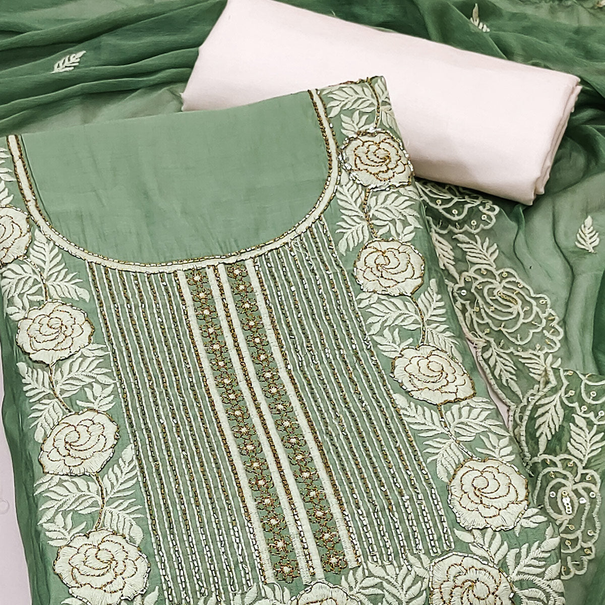 Green Cotton Silk Dress Material Embellished With Floral Embroidery & Intricate Handwork