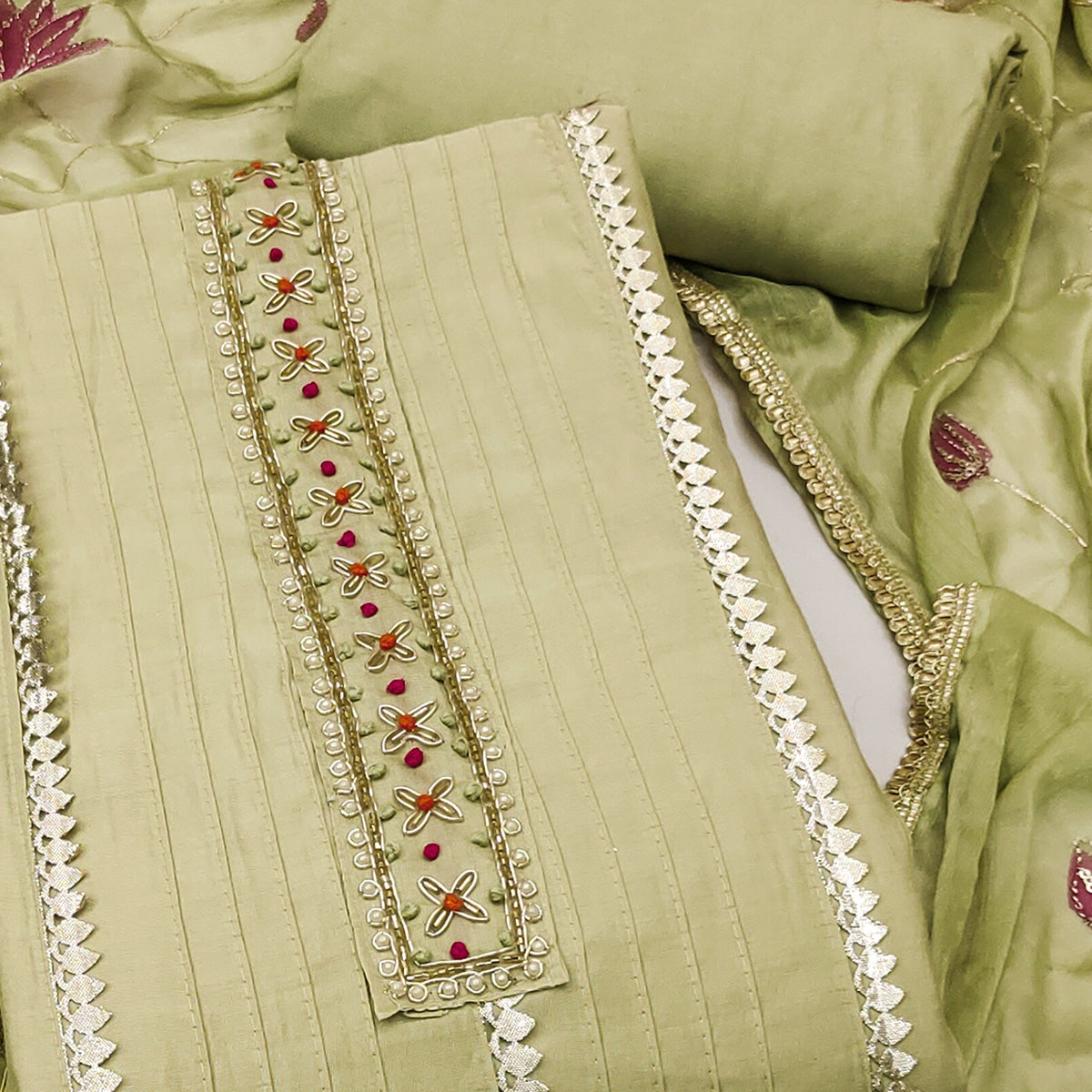 Green Cotton Silk Dress Material Embellished With Elegant Moti Handwork & Delicate Gota Patti Lace