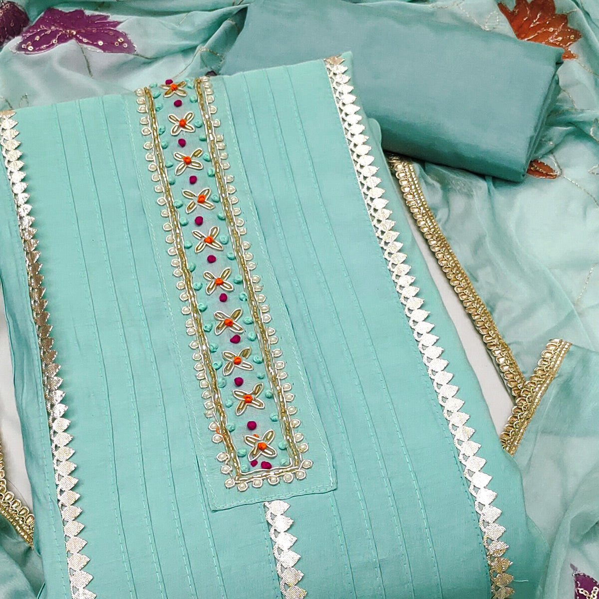 Turquoise Cotton Silk Dress Material Embellished With Elegant Moti Handwork & Gota Patti Lace