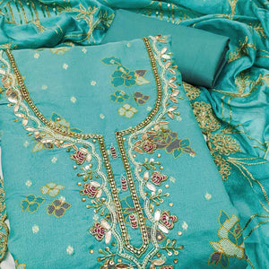 Rama Green Unstitched Dress Material in Shimmer Cotton Silk with Delicate Thread Work Embroidery