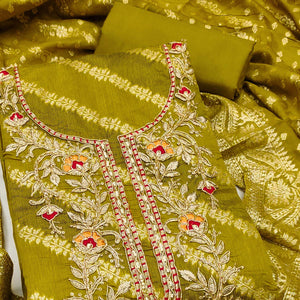 Green Shimmer Cotton Silk Suit Material Featuring Zari Weaving and Artistic Embroidered Detailing