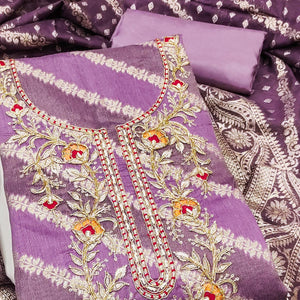 Purple Shimmer Cotton Silk Suit Material Featuring Zari Weaving and Artistic Embroidered Detailing