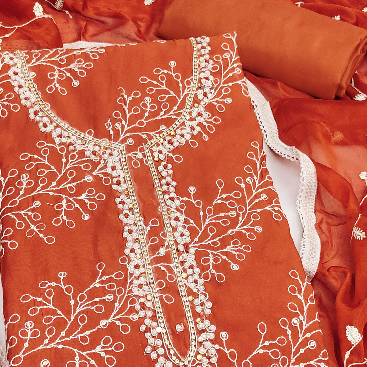 Exclusive Rust Floral Embroidery Cotton Silk Dress Material Enhanced With Moti & Sequins Work