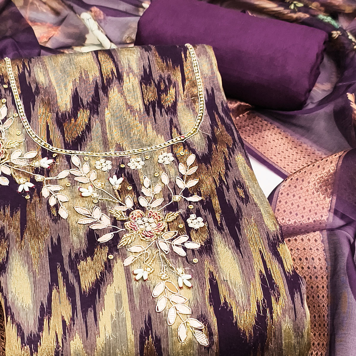 Luxury Purple Ikkat Weaving Viscose Dress Material Adorned With Floral Pearl & Cutdana Handwork