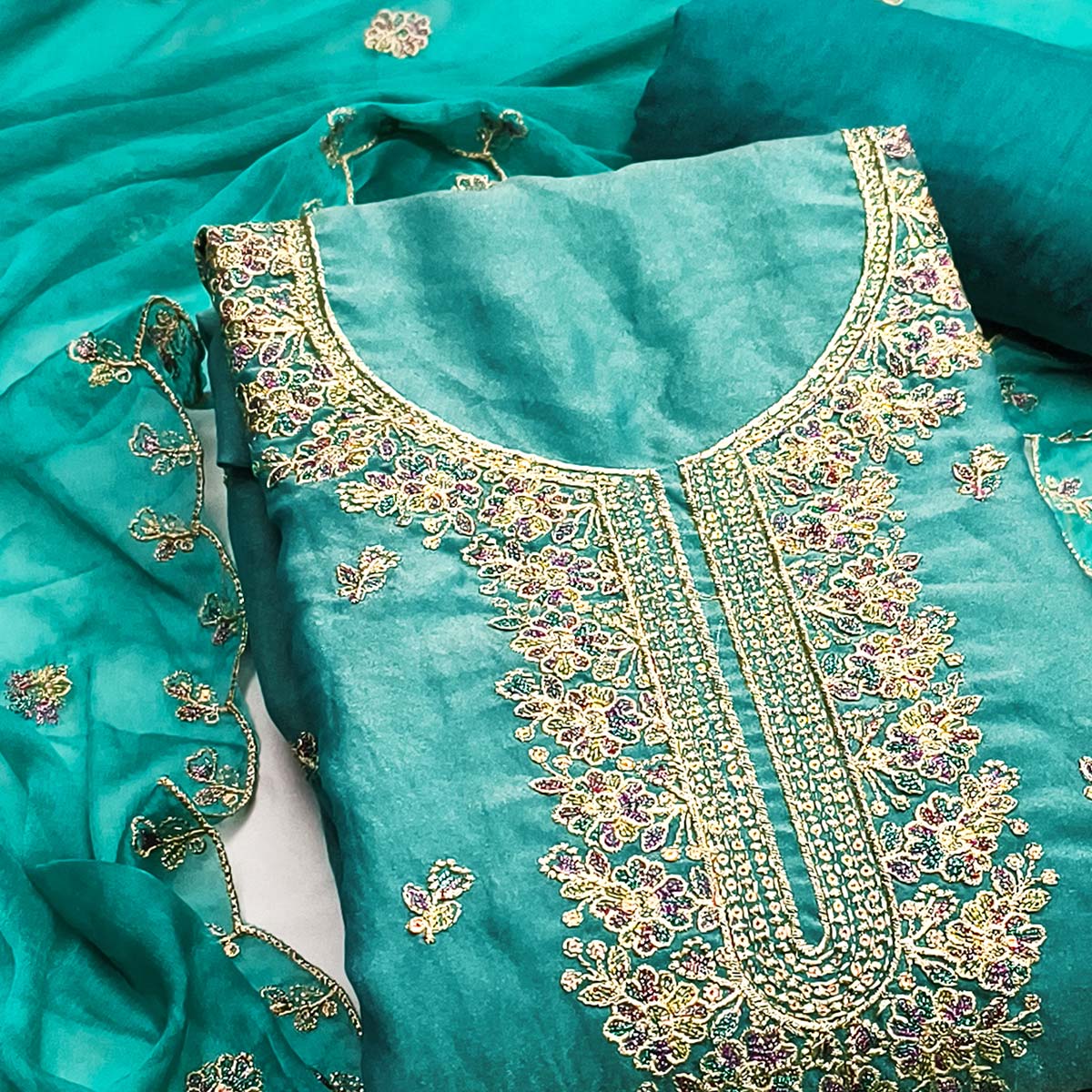 Graceful Turquoise Floral Sequins Embroidered With Handwork Georgette Dress Material