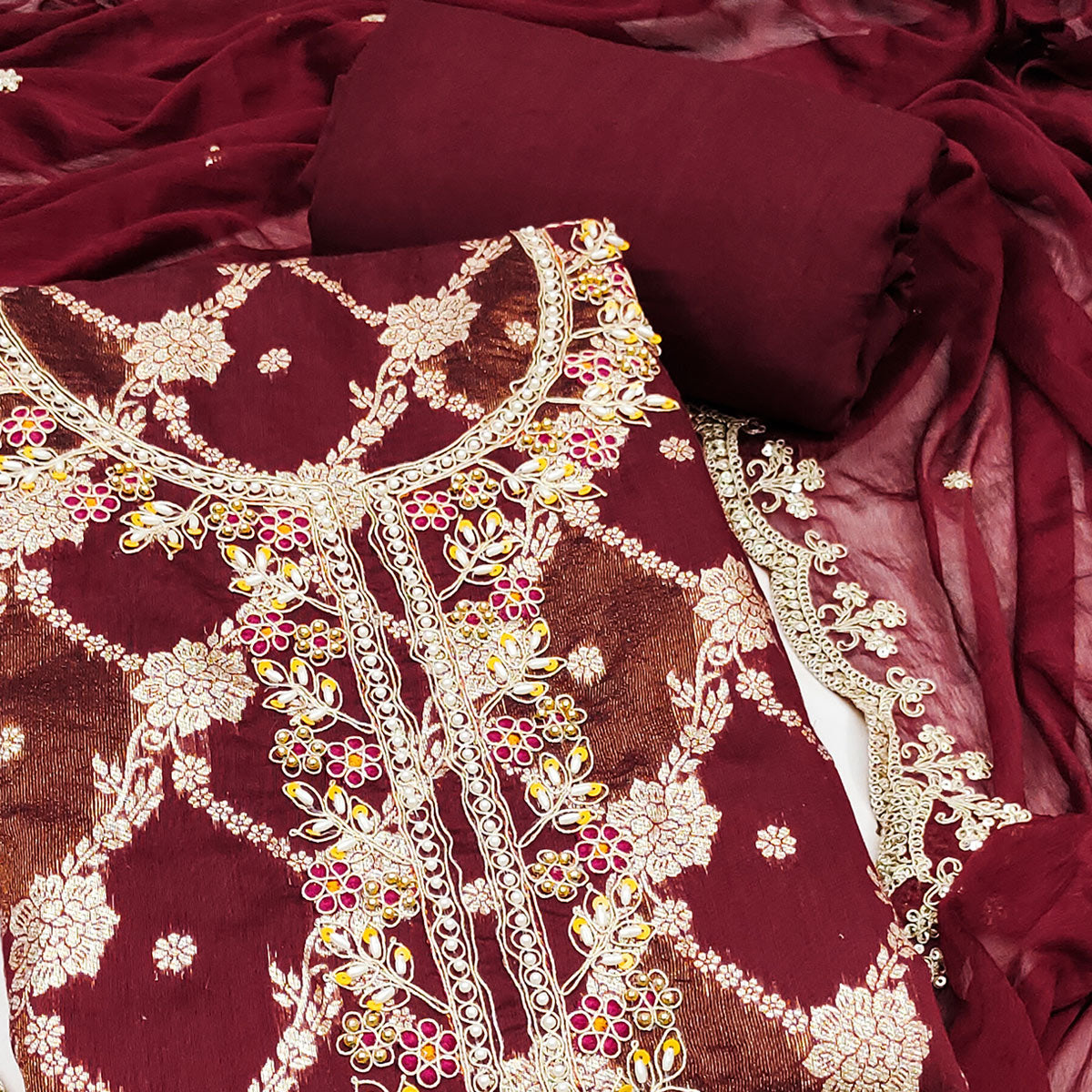 Opulent Maroon Floral Woven Banarasi Silk Dress Material With Detailed Handwork & Sequin Embroidery