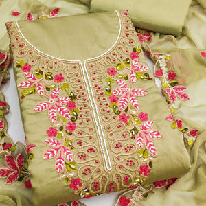 Charming Green Floral Embroidery Cotton Silk Dress Material Enhanced With Elegant Moti Handwork