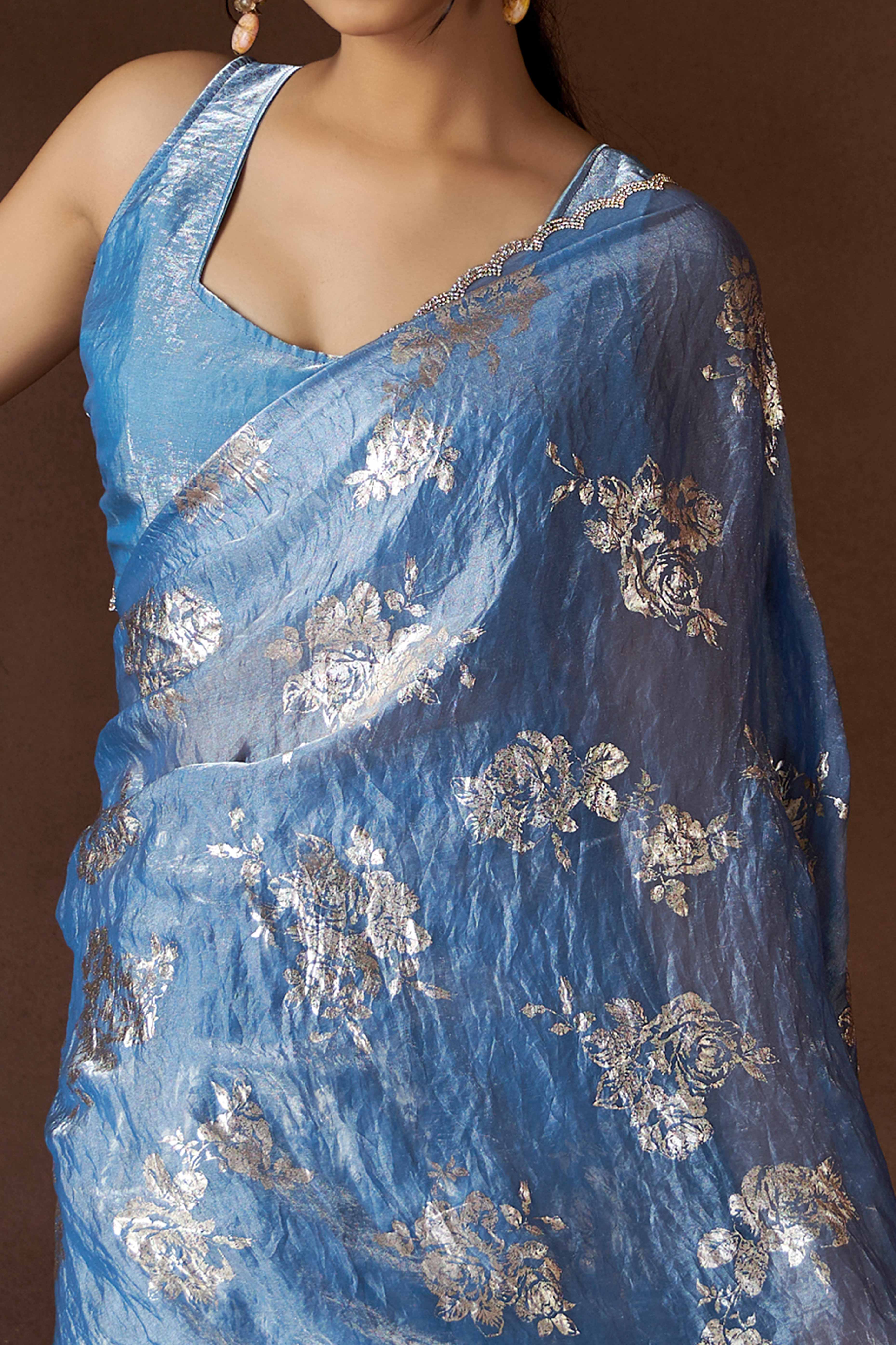 Blue Floral Foil Printed Satin Silk Saree With Zarkan Border