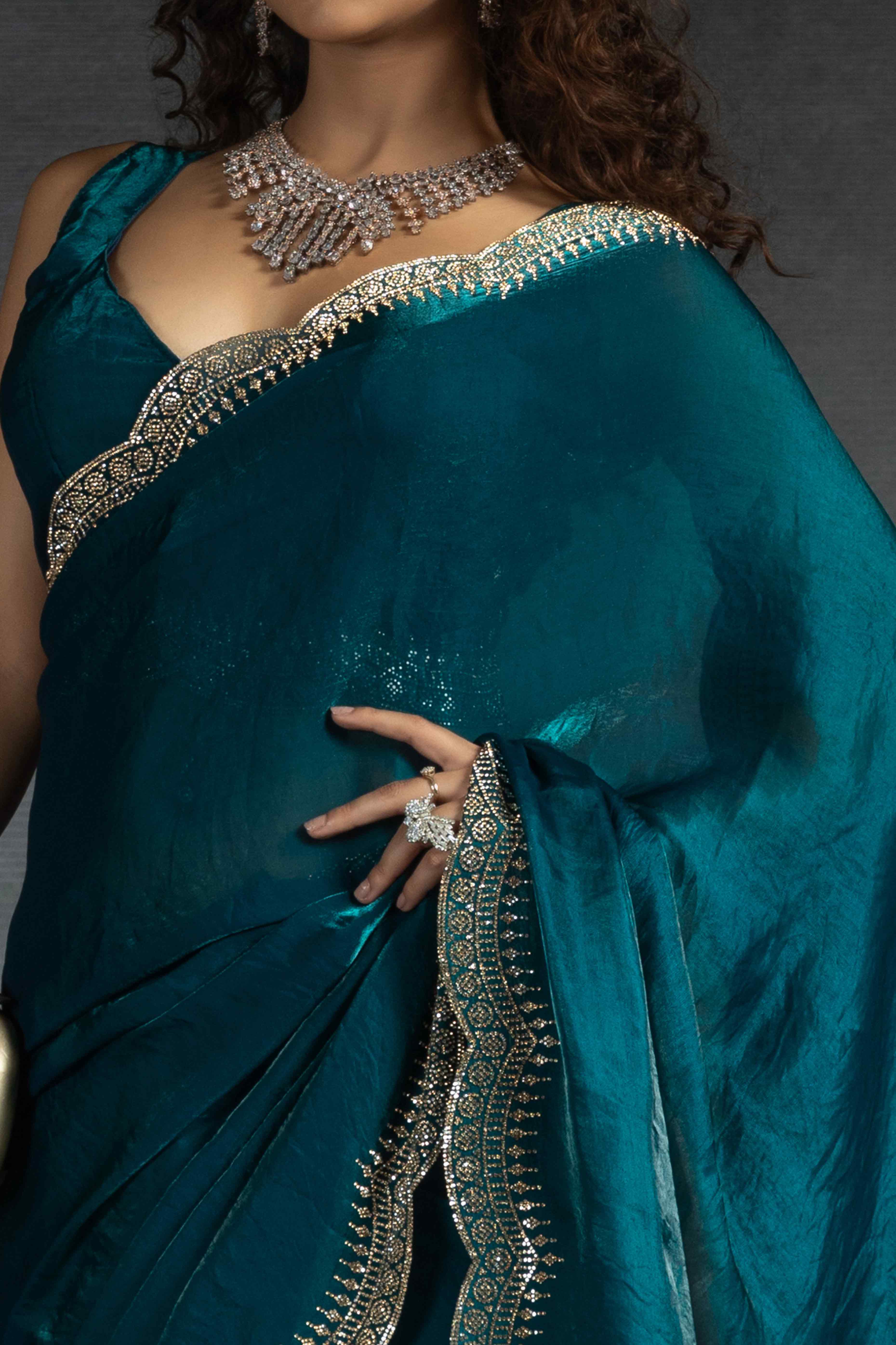 Teal Satin Saree Embellished with Stones for a Party Look