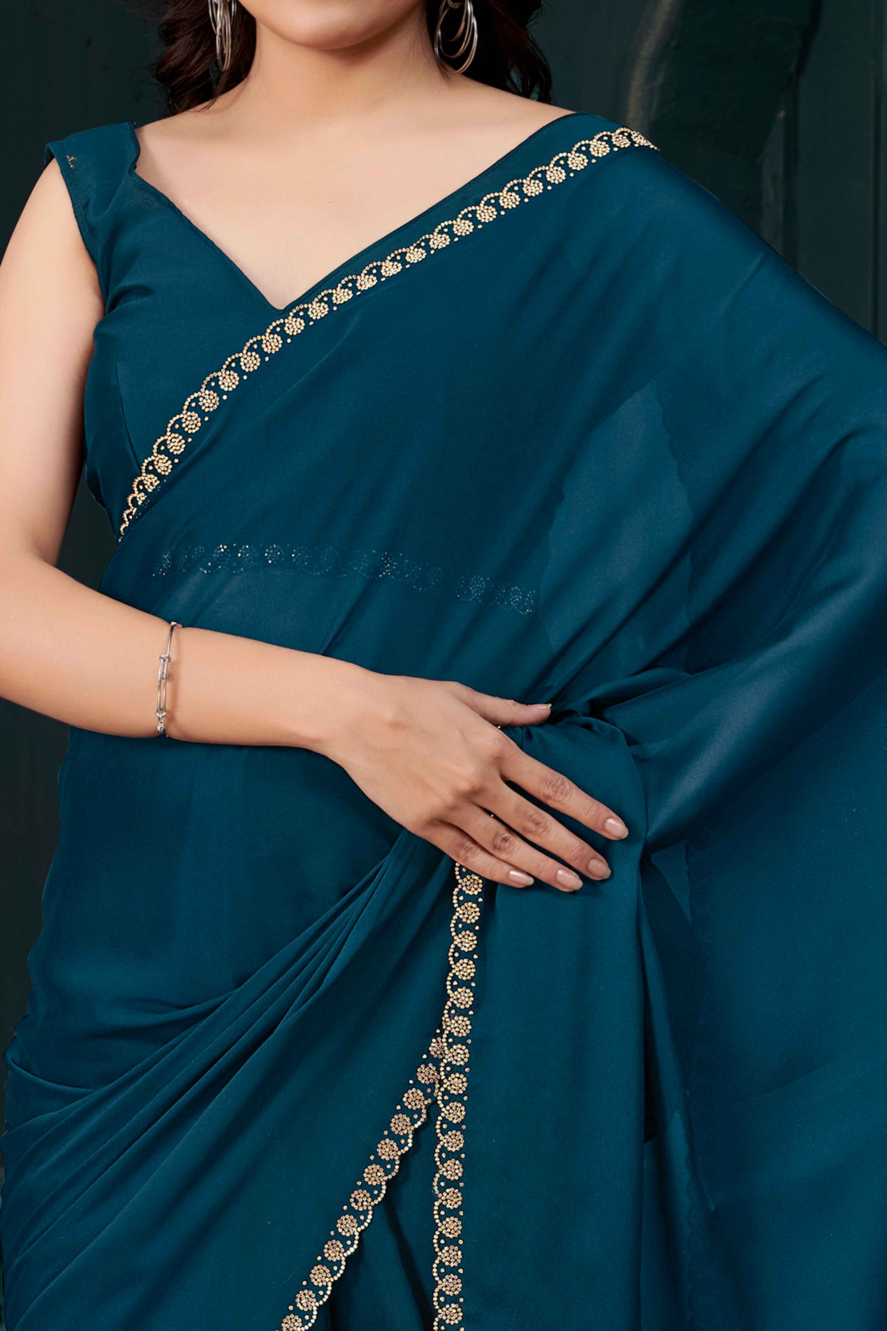 Petrol Blue Crepe Silk Solid Saree with Elegant Zarkan Border Detailing