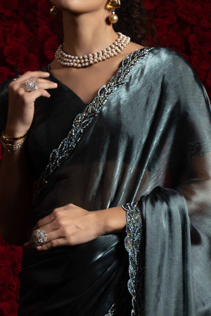 Grey Solid Tissue Chiffon Saree Accented With Elegant Zarkan Work Border