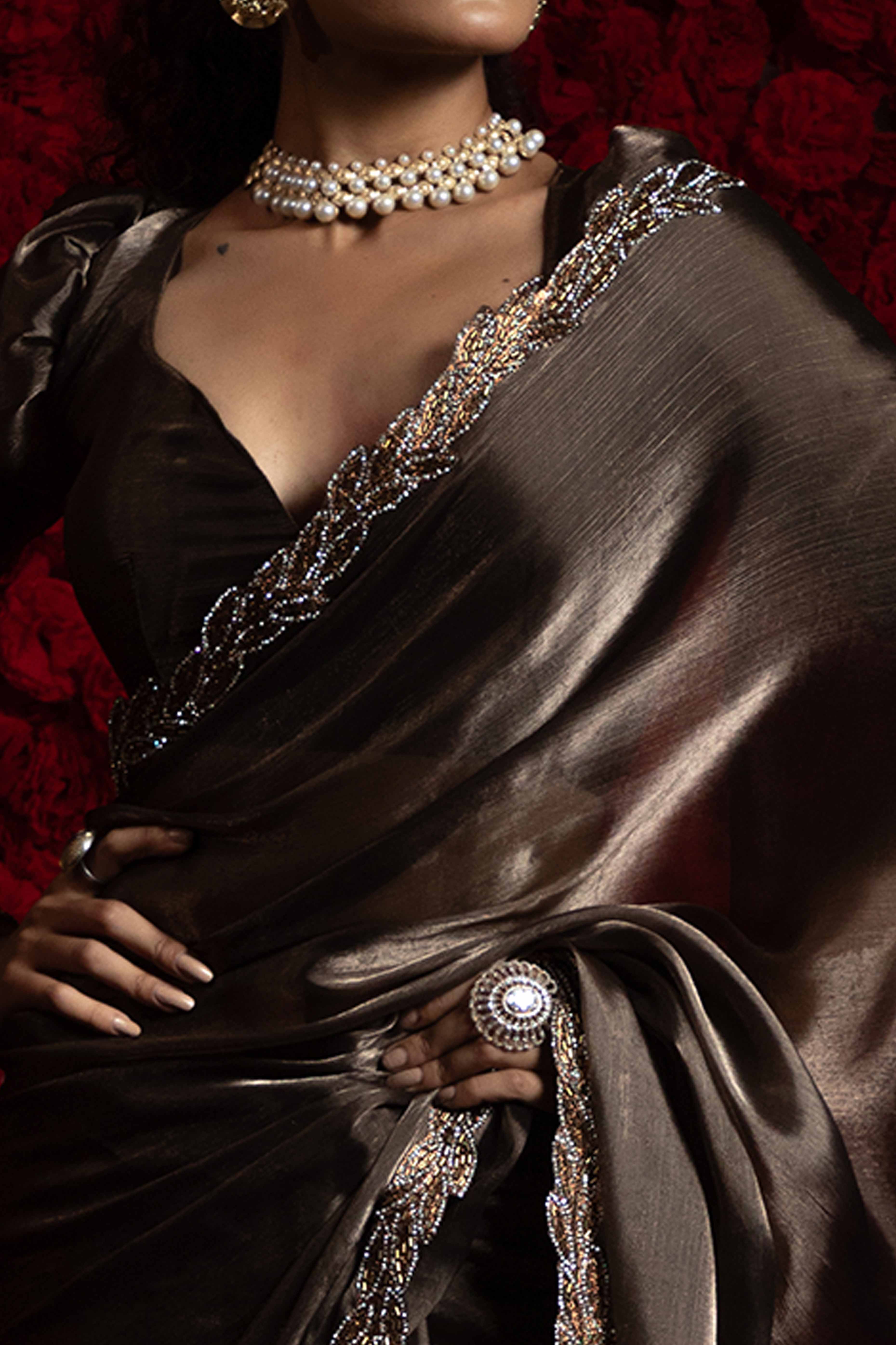 Dark Brown Solid Tissue Chiffon Saree Accented With Elegant Zarkan Work Border